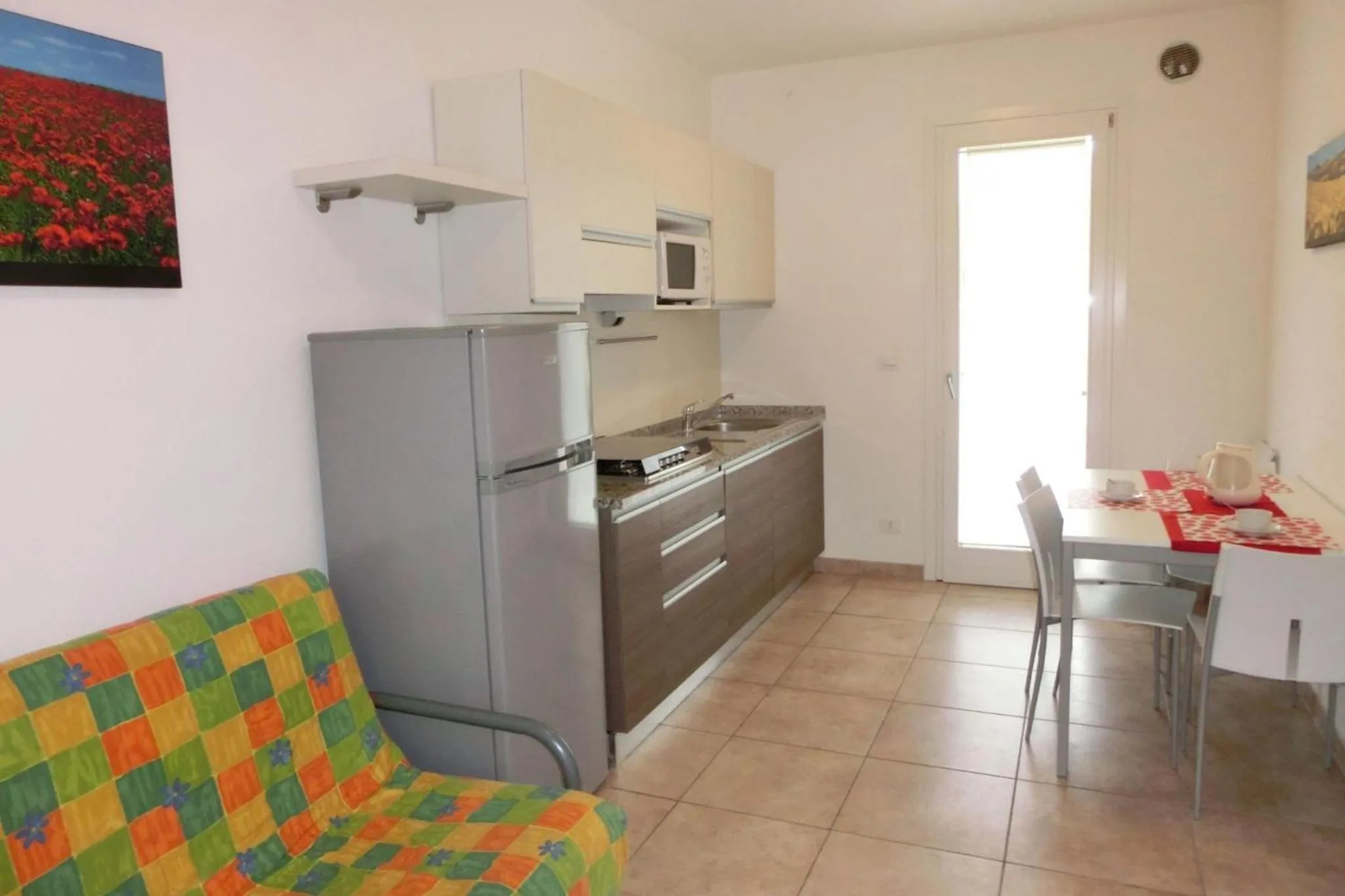 Bright fenced garden flat with swimming pool