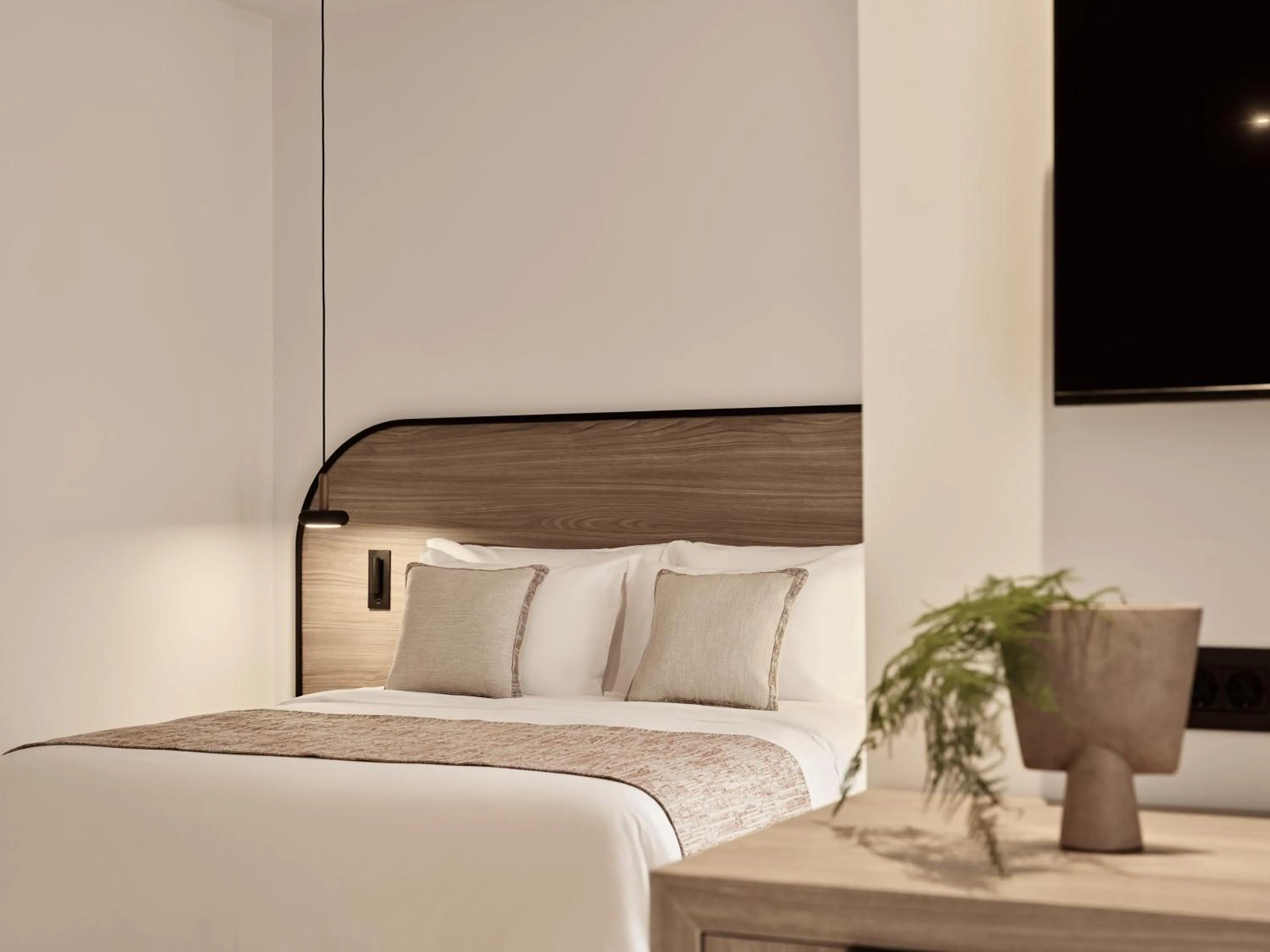 Bed in NAUMA PAROS Design Boutique Hotel-Adults Only