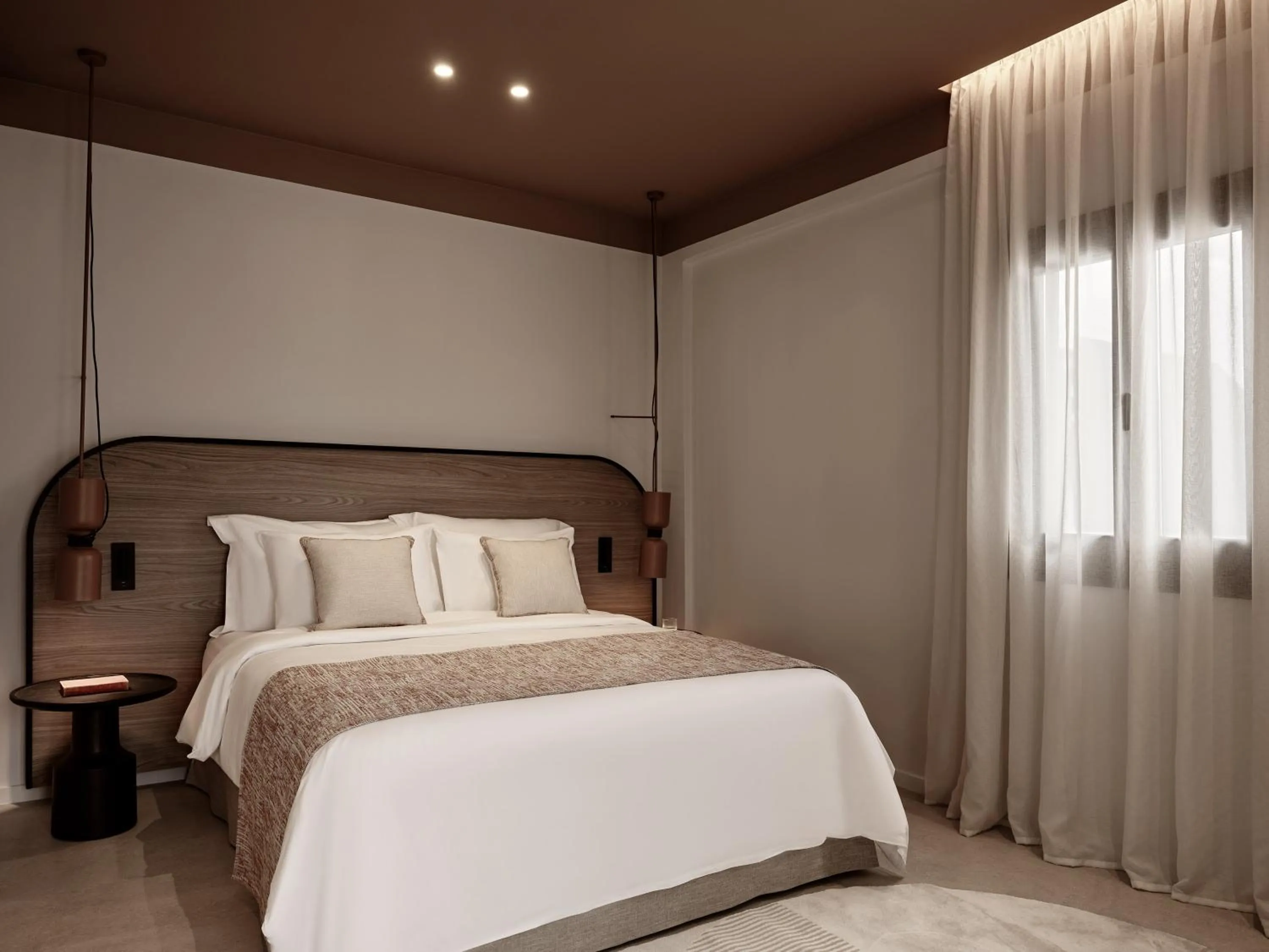 Bed in NAUMA PAROS Design Boutique Hotel-Adults Only