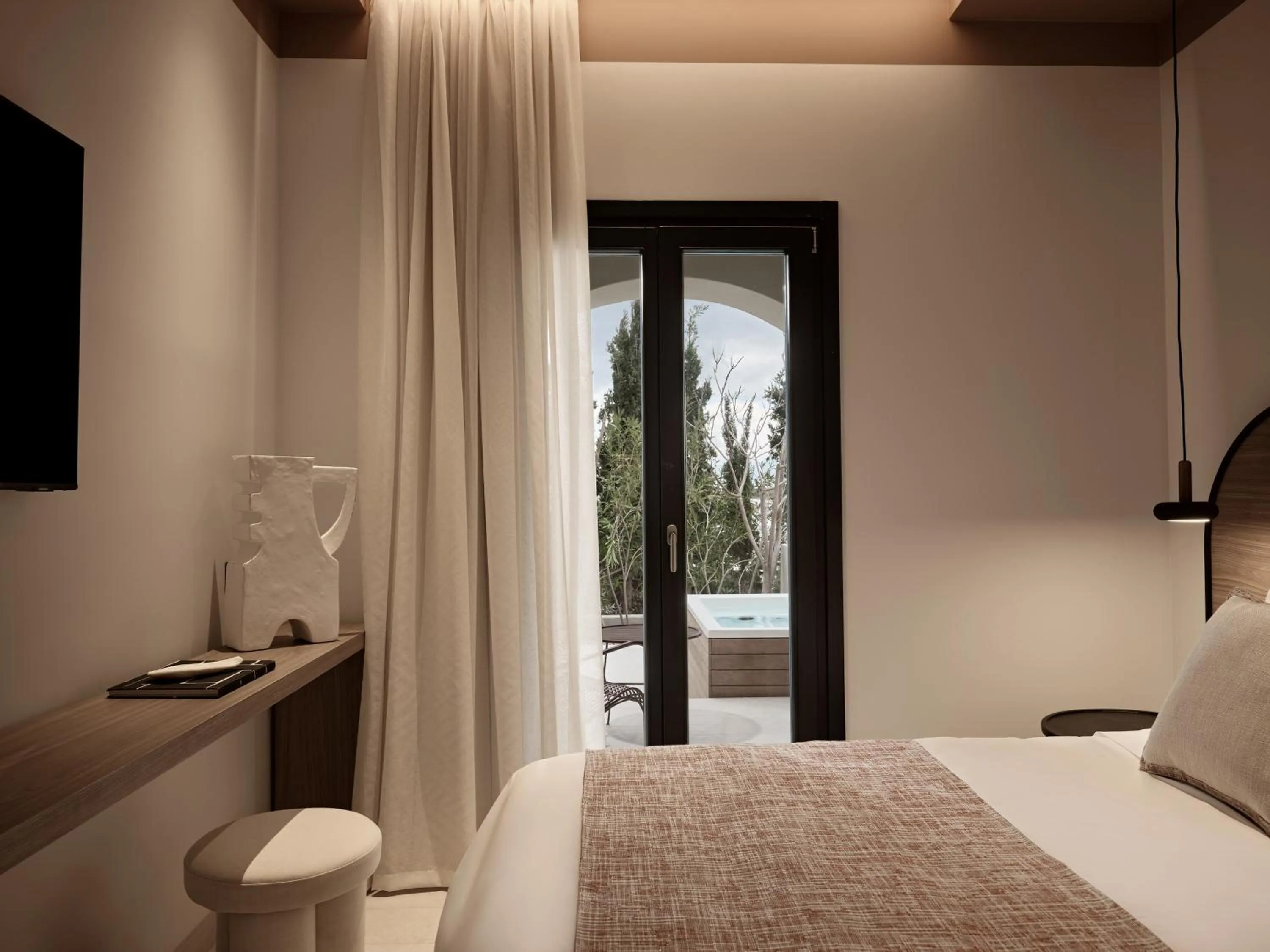 Bed in NAUMA PAROS Design Boutique Hotel-Adults Only