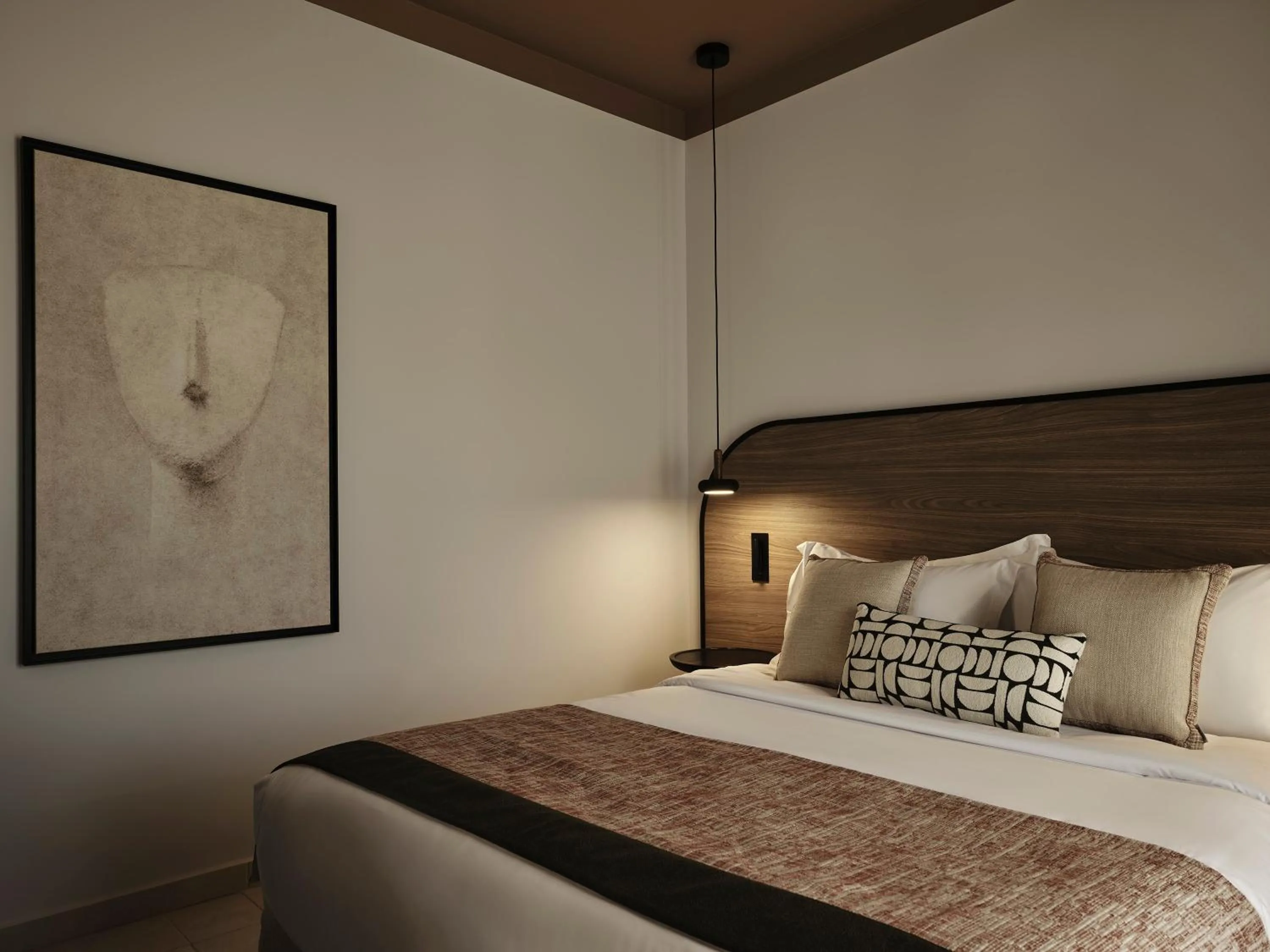 Bed in NAUMA PAROS Design Boutique Hotel-Adults Only