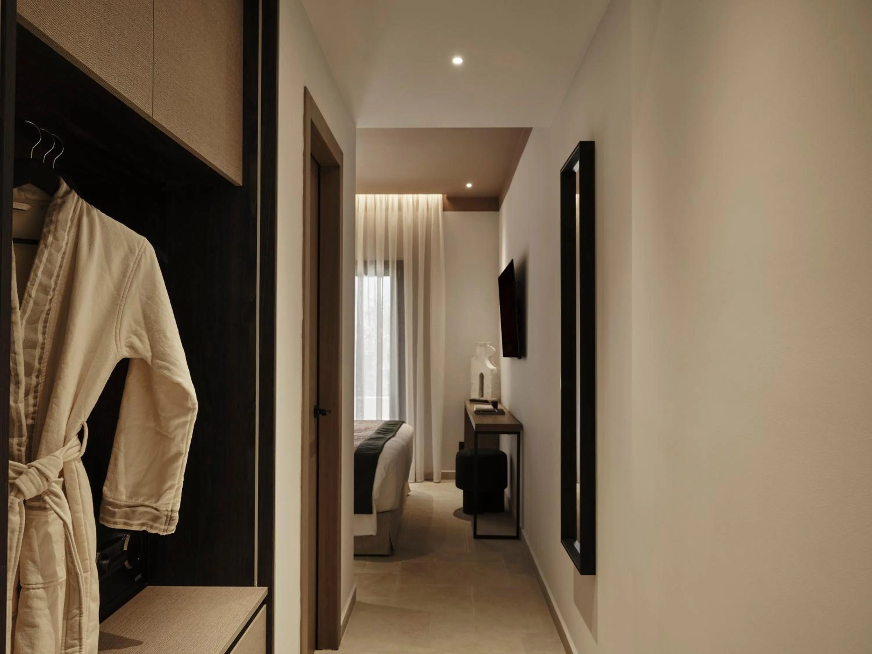 wardrobe in NAUMA PAROS Design Boutique Hotel-Adults Only