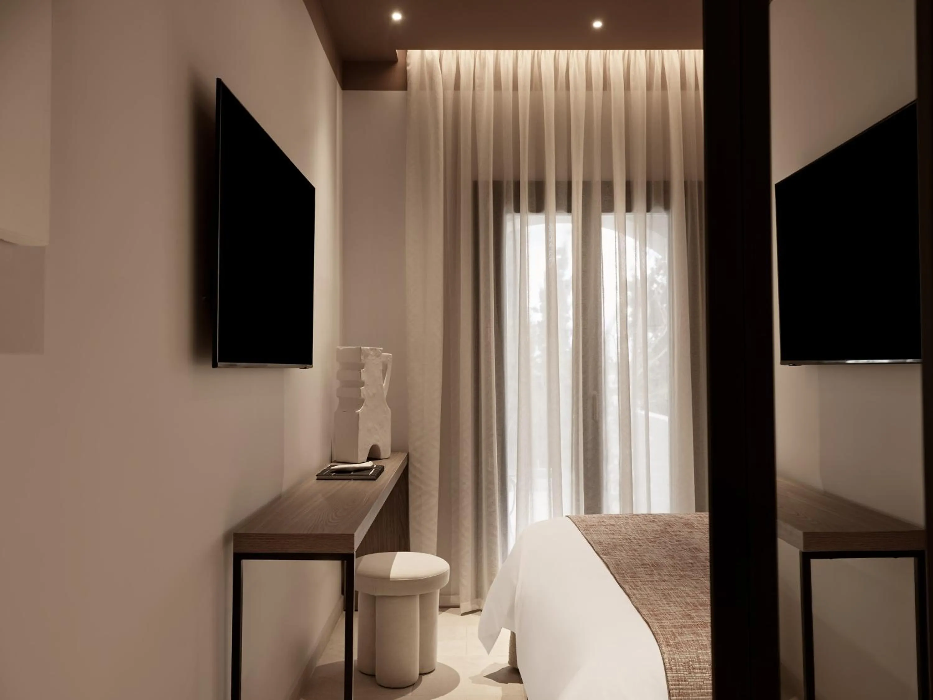 TV and multimedia in NAUMA PAROS Design Boutique Hotel-Adults Only