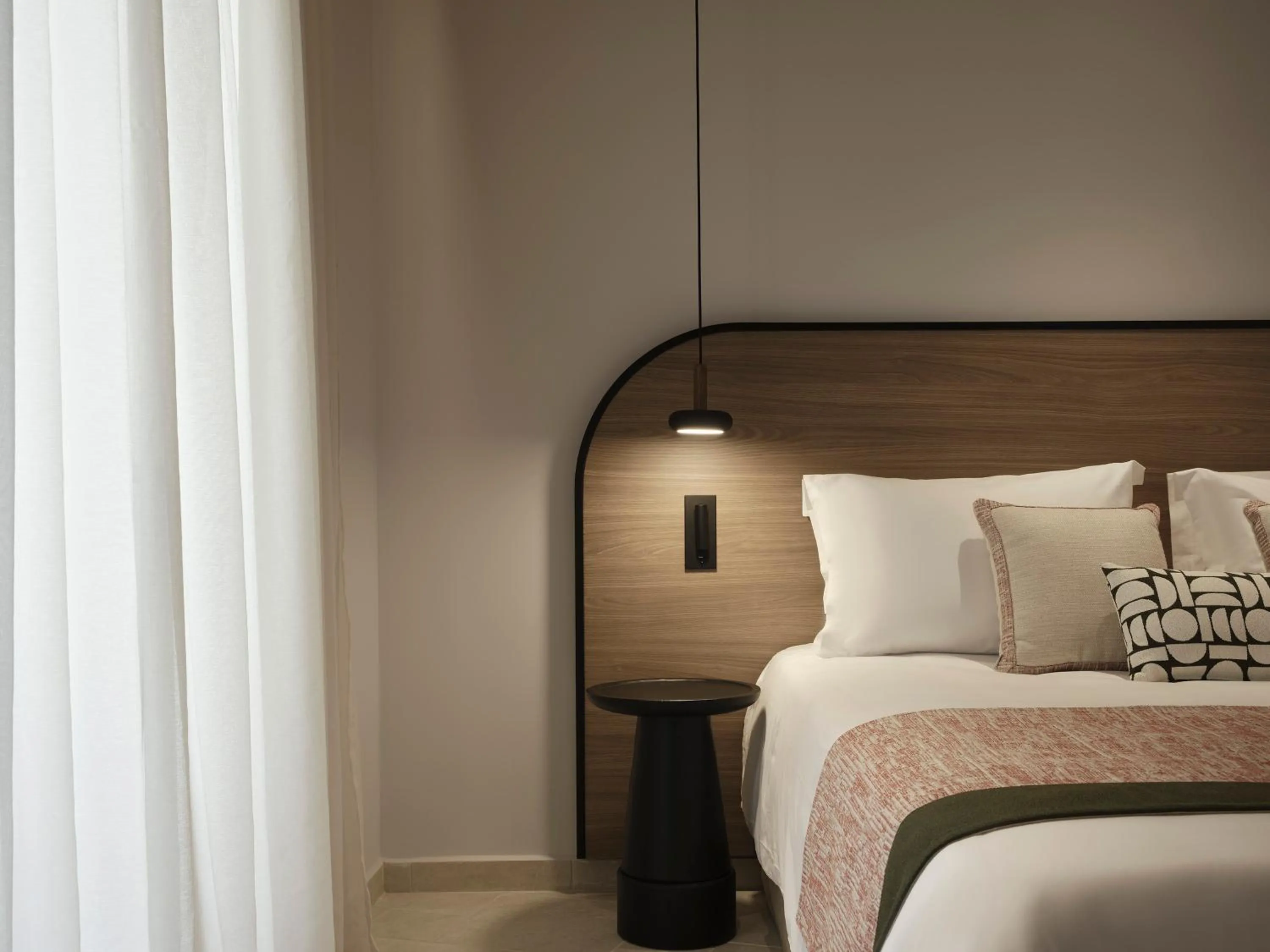 Bed in NAUMA PAROS Design Boutique Hotel-Adults Only