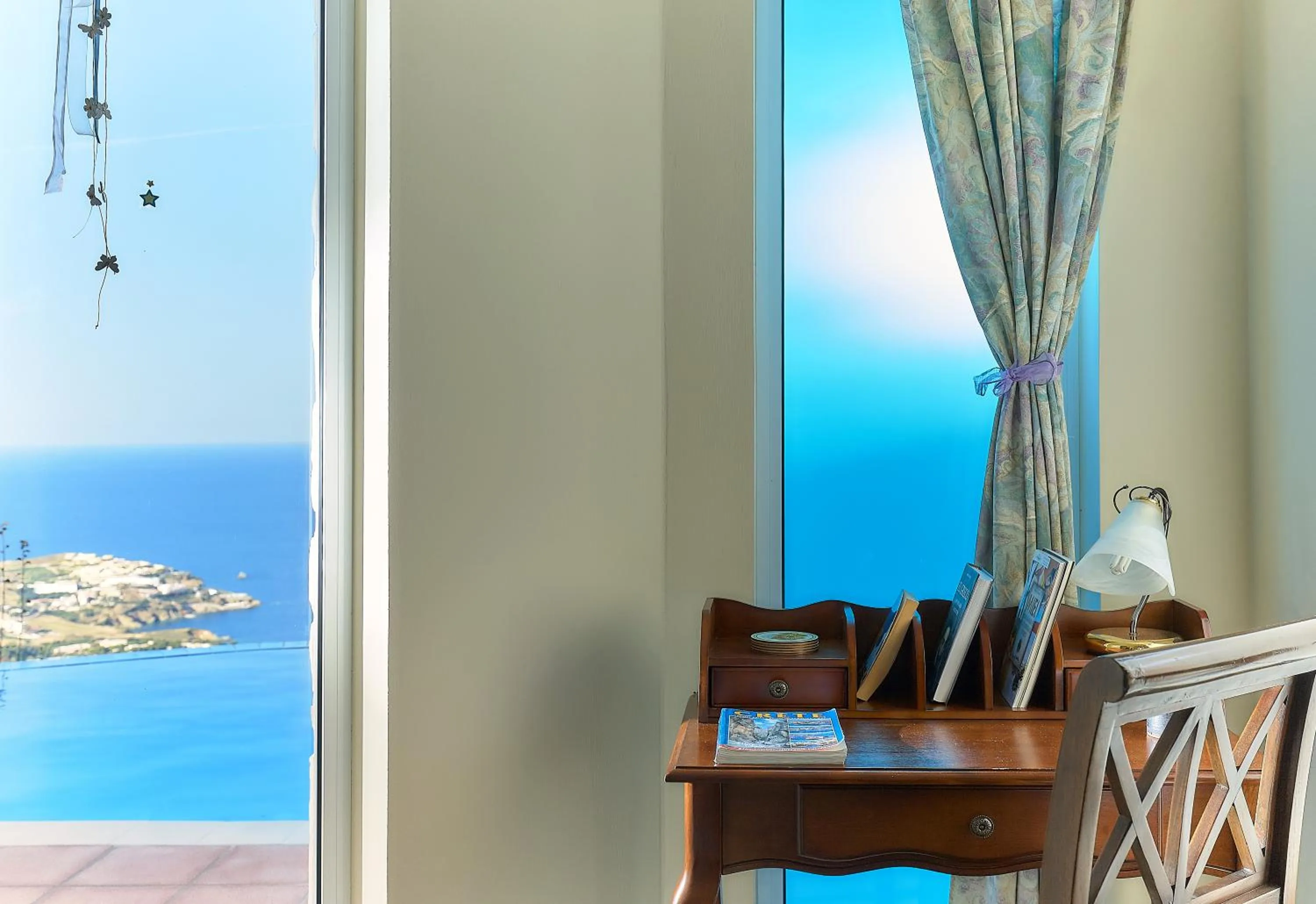 Library in Nymphes Luxury Apartments