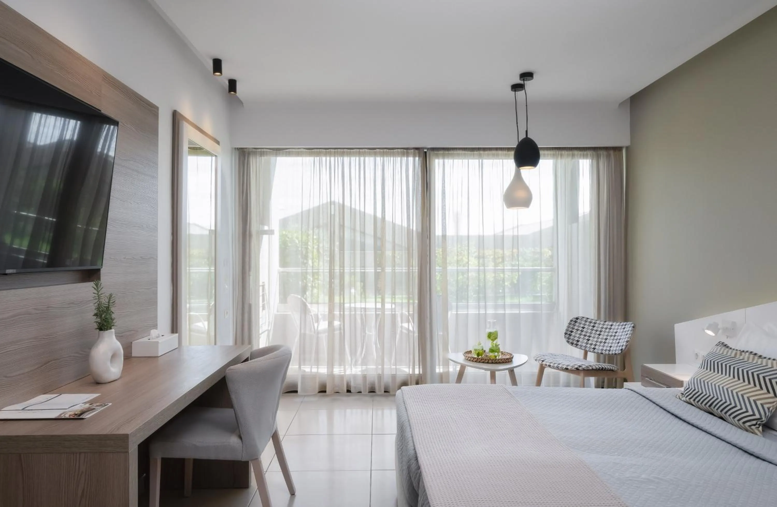 Photo of the whole room, Bed in Kassandra Bay Resort, Suites & Spa