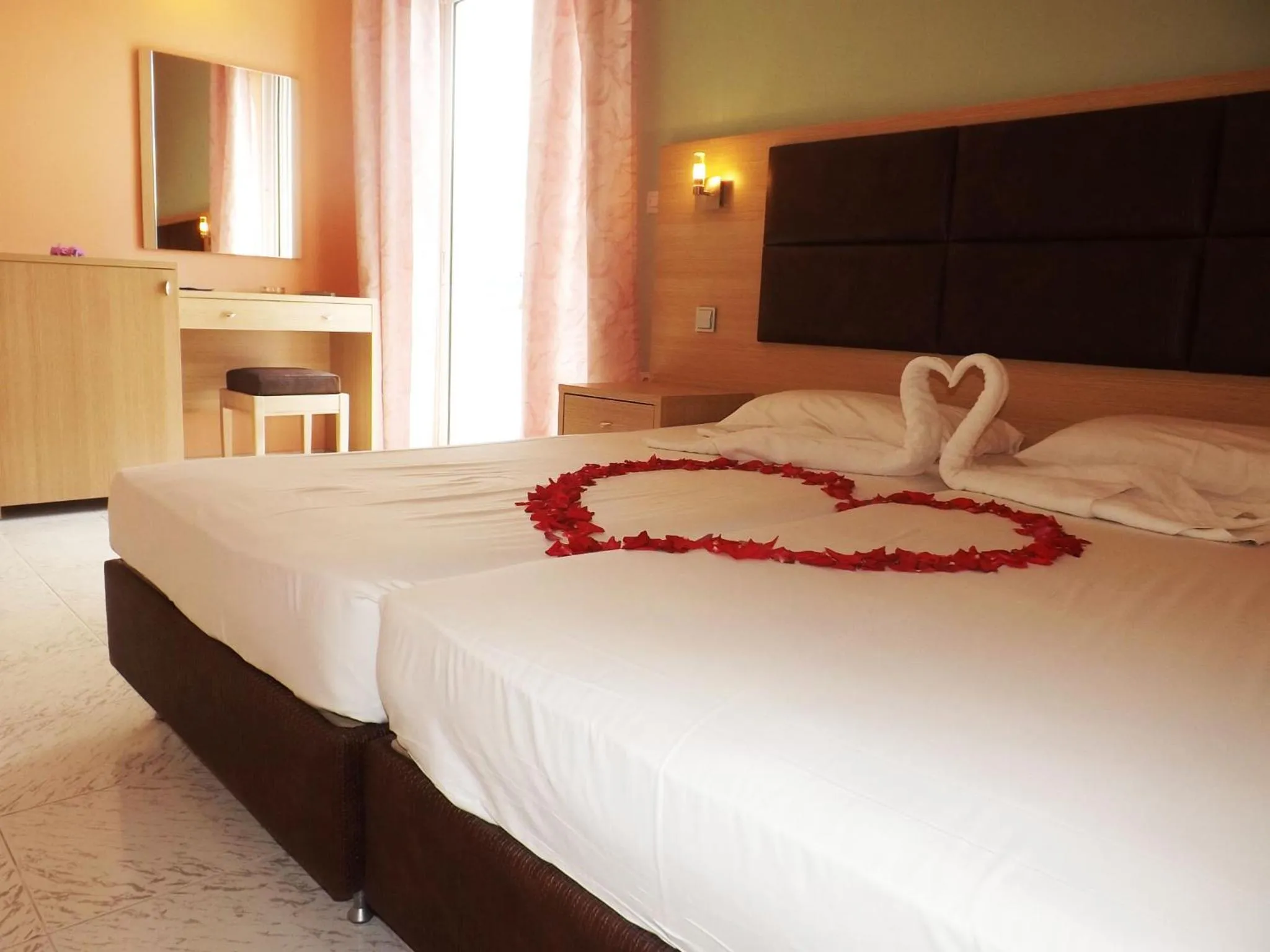 Bed in Leonidas Hotel & Studios