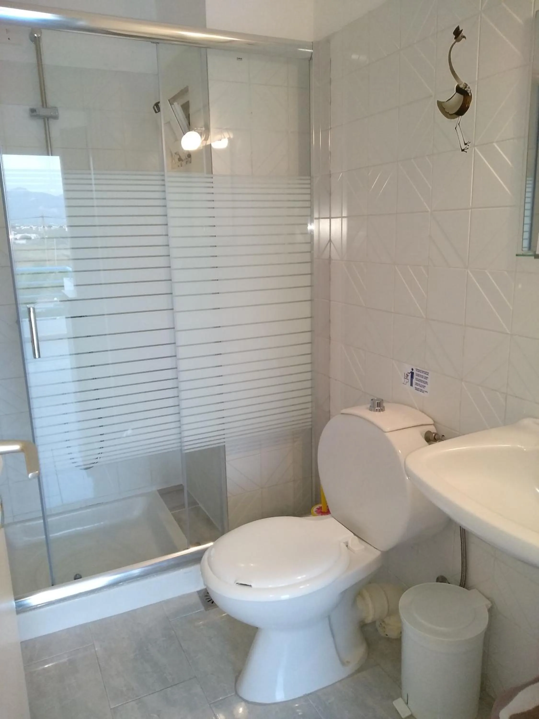 Bathroom in Leonidas Hotel & Studios