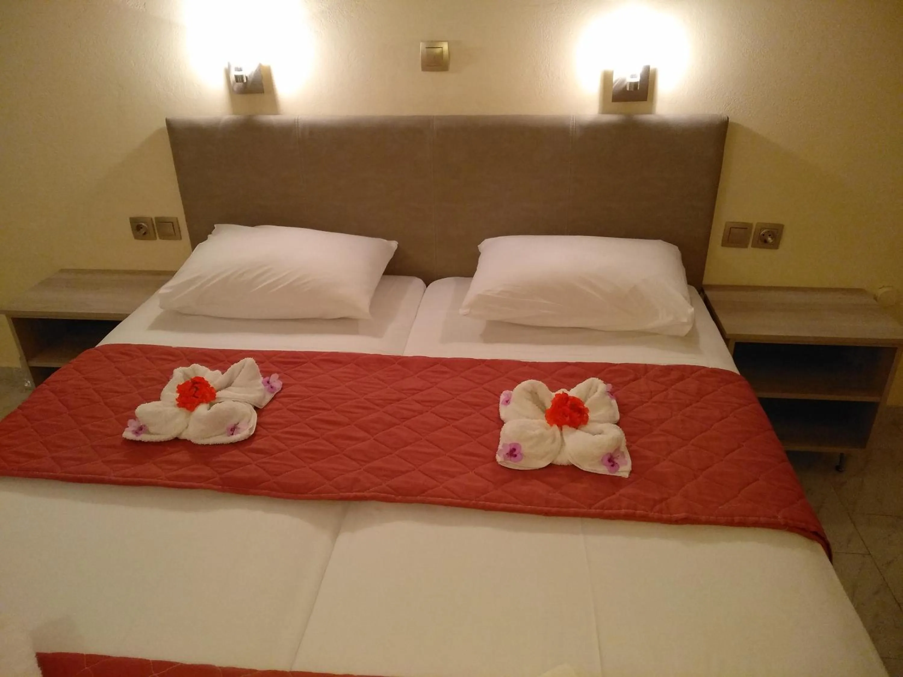 Bed in Leonidas Hotel & Studios