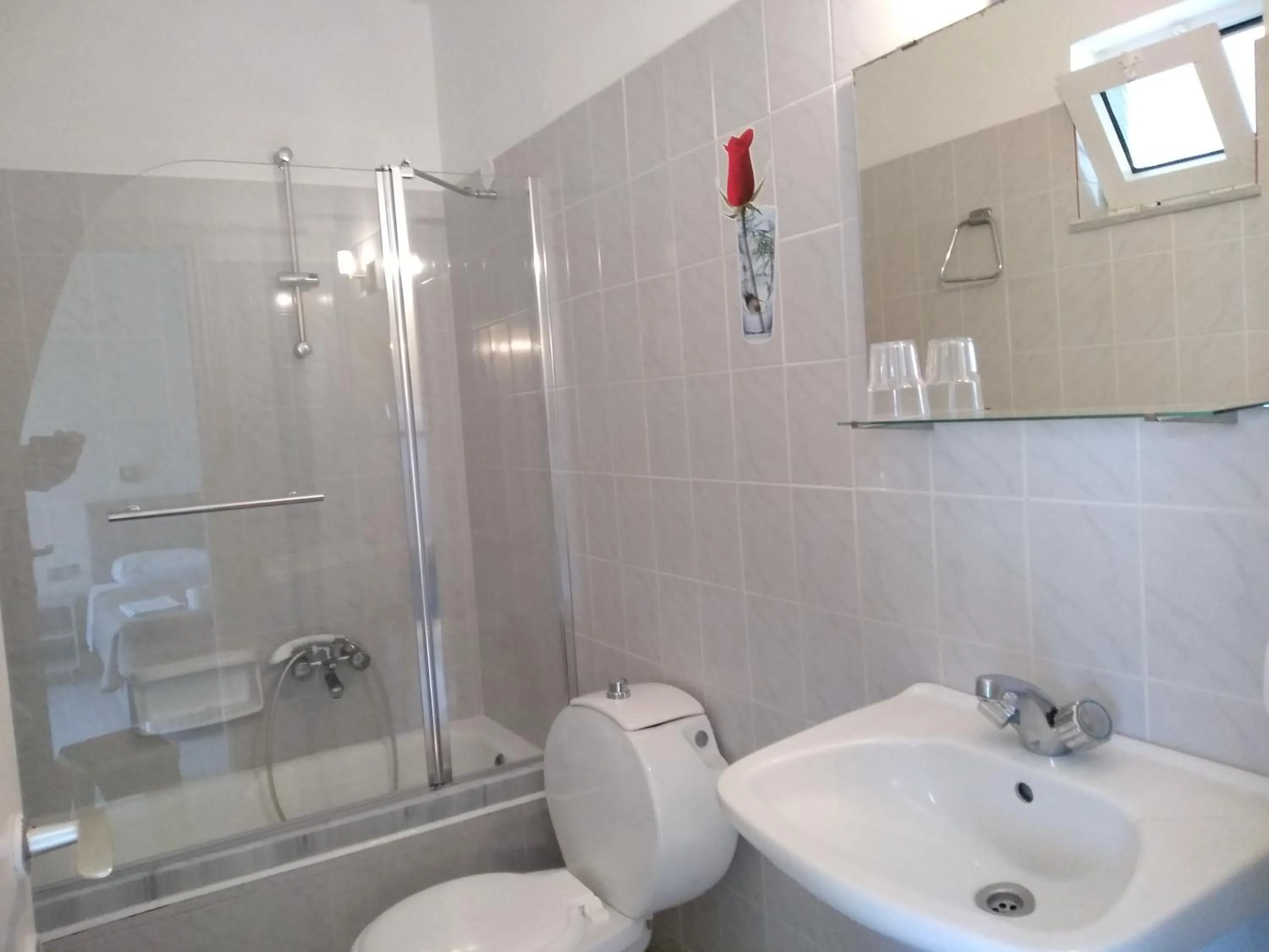 Bathroom in Leonidas Hotel & Studios