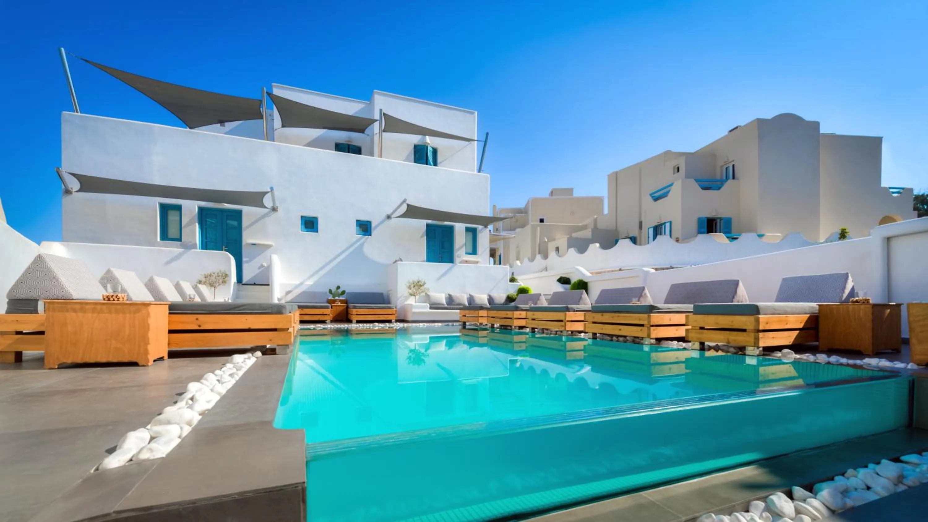 Swimming pool in Evgenia Villas & Suites by Calm Collection