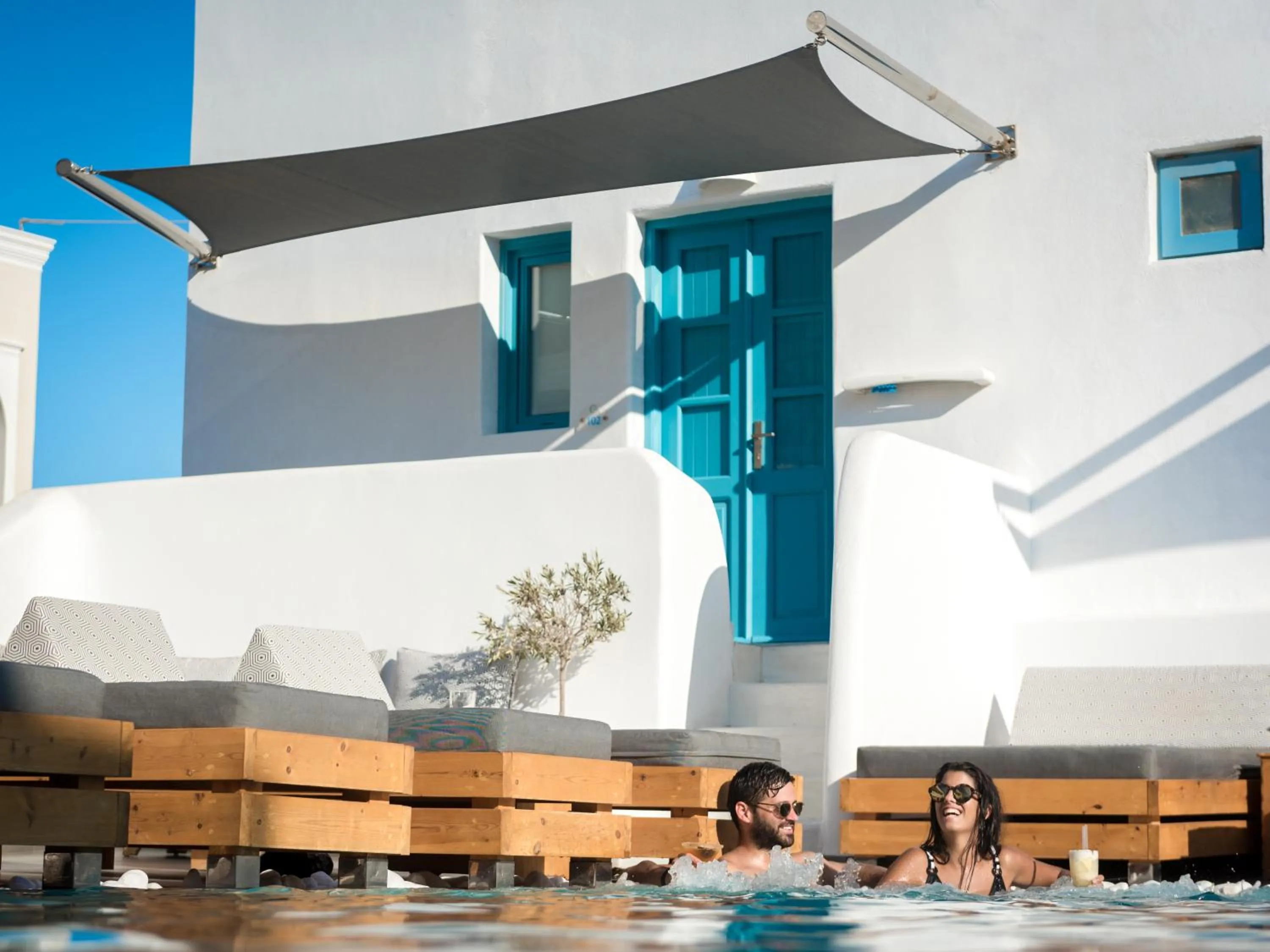 Swimming pool in Evgenia Villas & Suites by Calm Collection