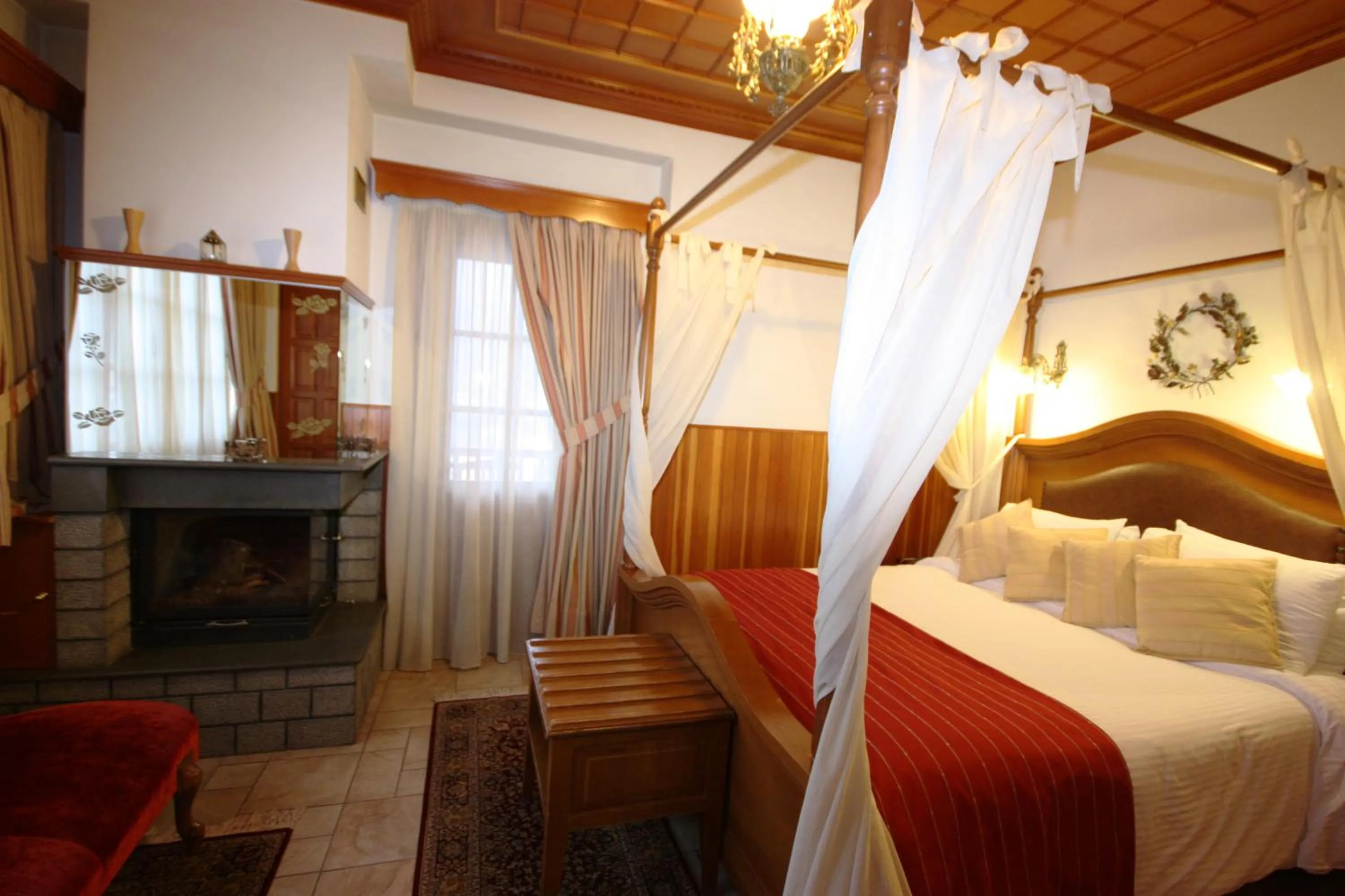 Photo of the whole room, Bed in Archontiko Metsovou Luxury Boutique Spa Hotel