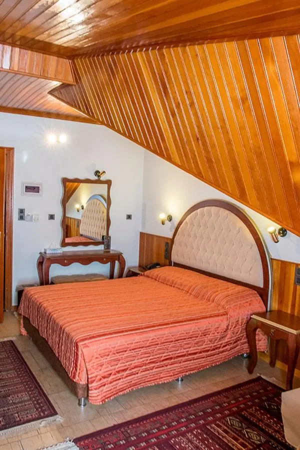 Bed in Hotel Apollon