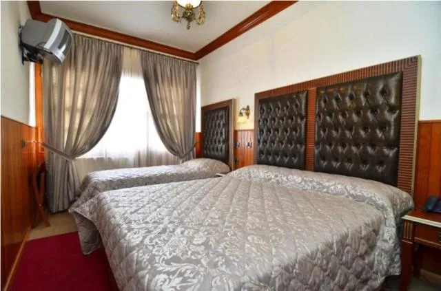 Bed in Hotel Apollon