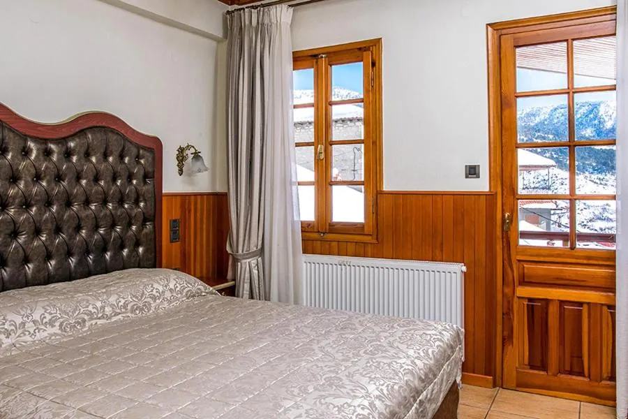 Bed in Hotel Apollon