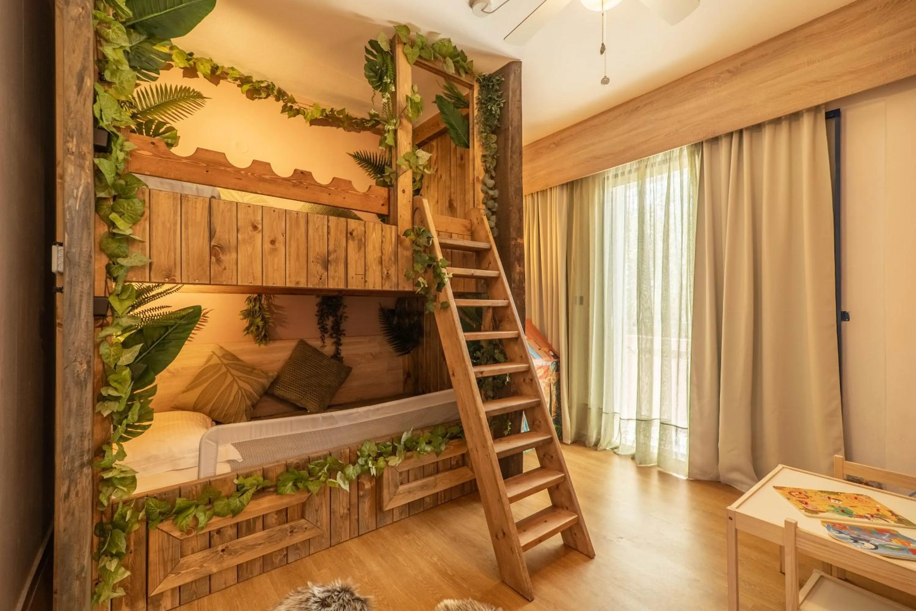 Bed in Paradisio Baby & Kinder Apartments