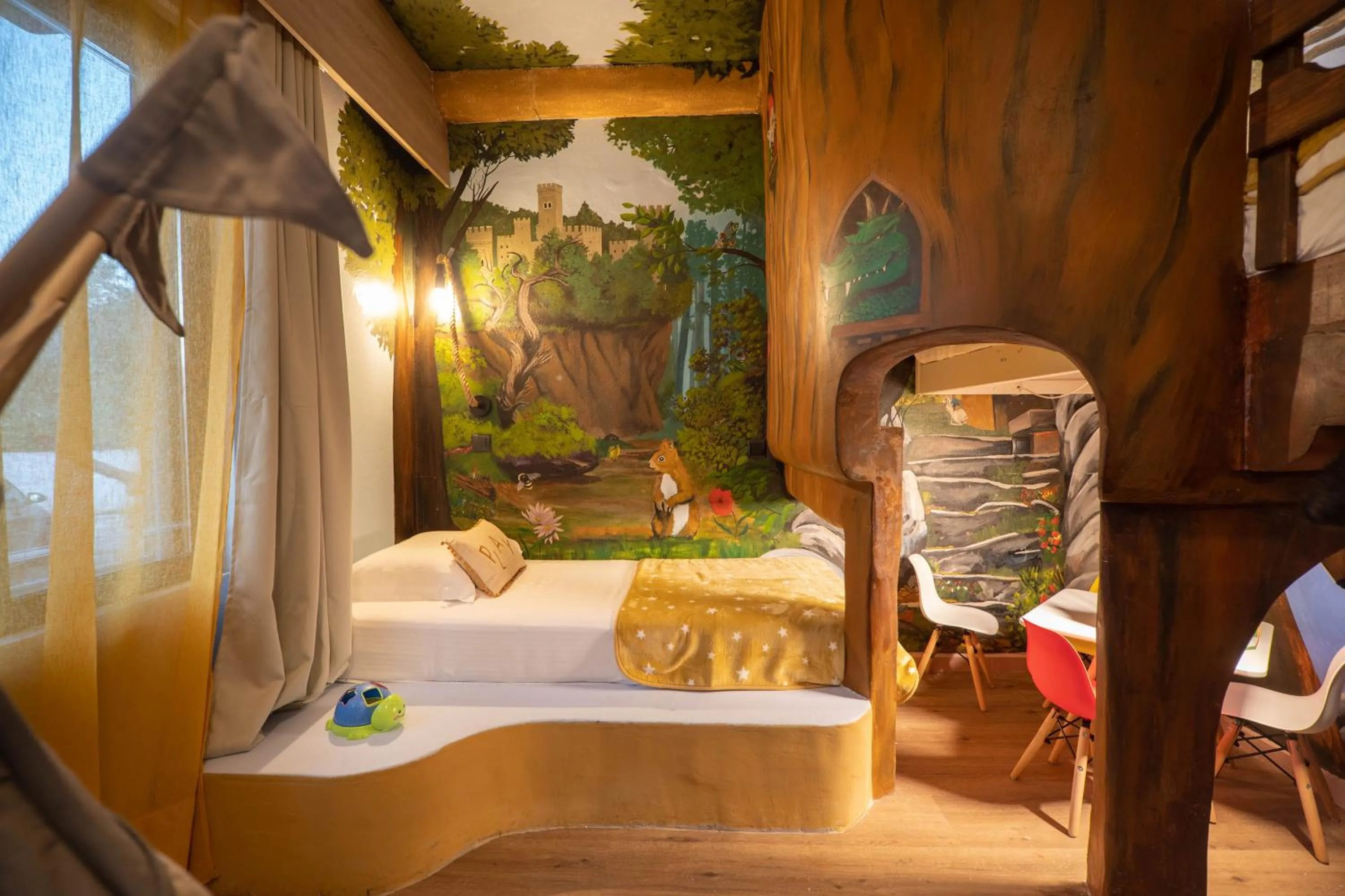 Bed in Paradisio Baby & Kinder Apartments