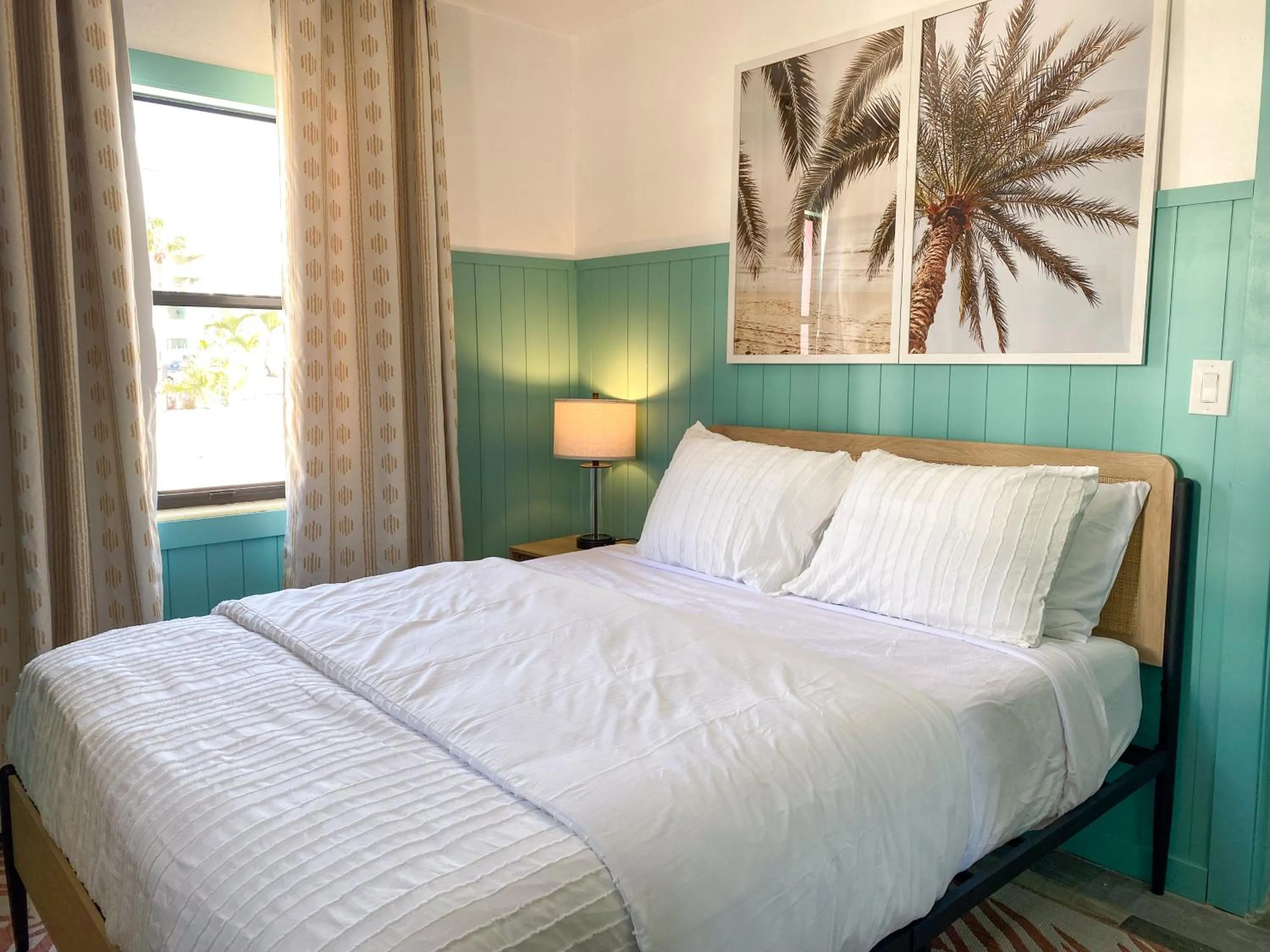 Bed in Oasis Palms Resort