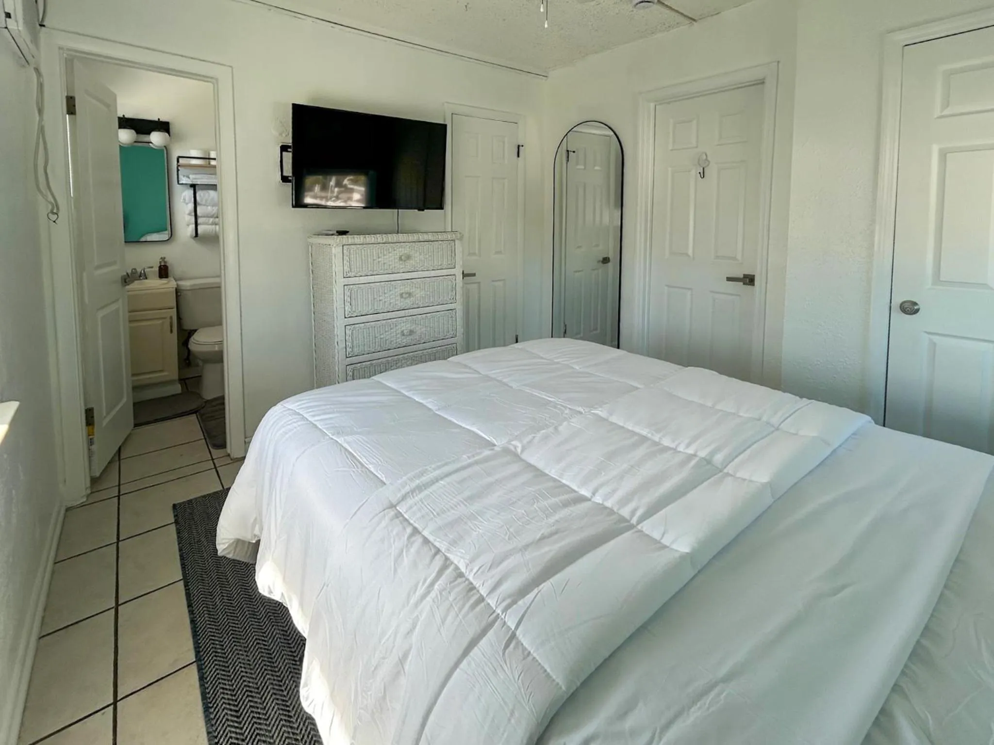 Bed in Oasis Palms Resort