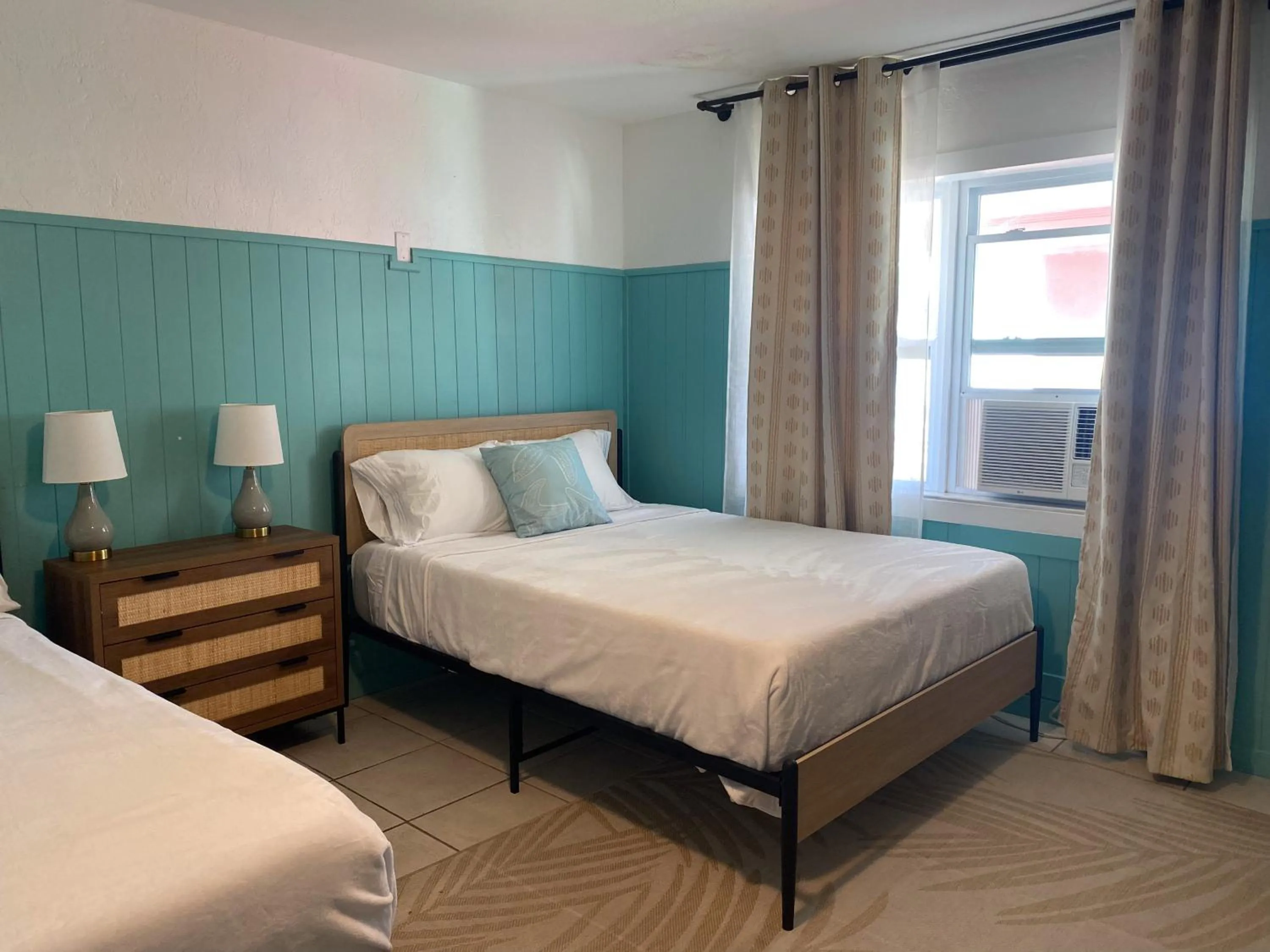 Bed in Oasis Palms Resort