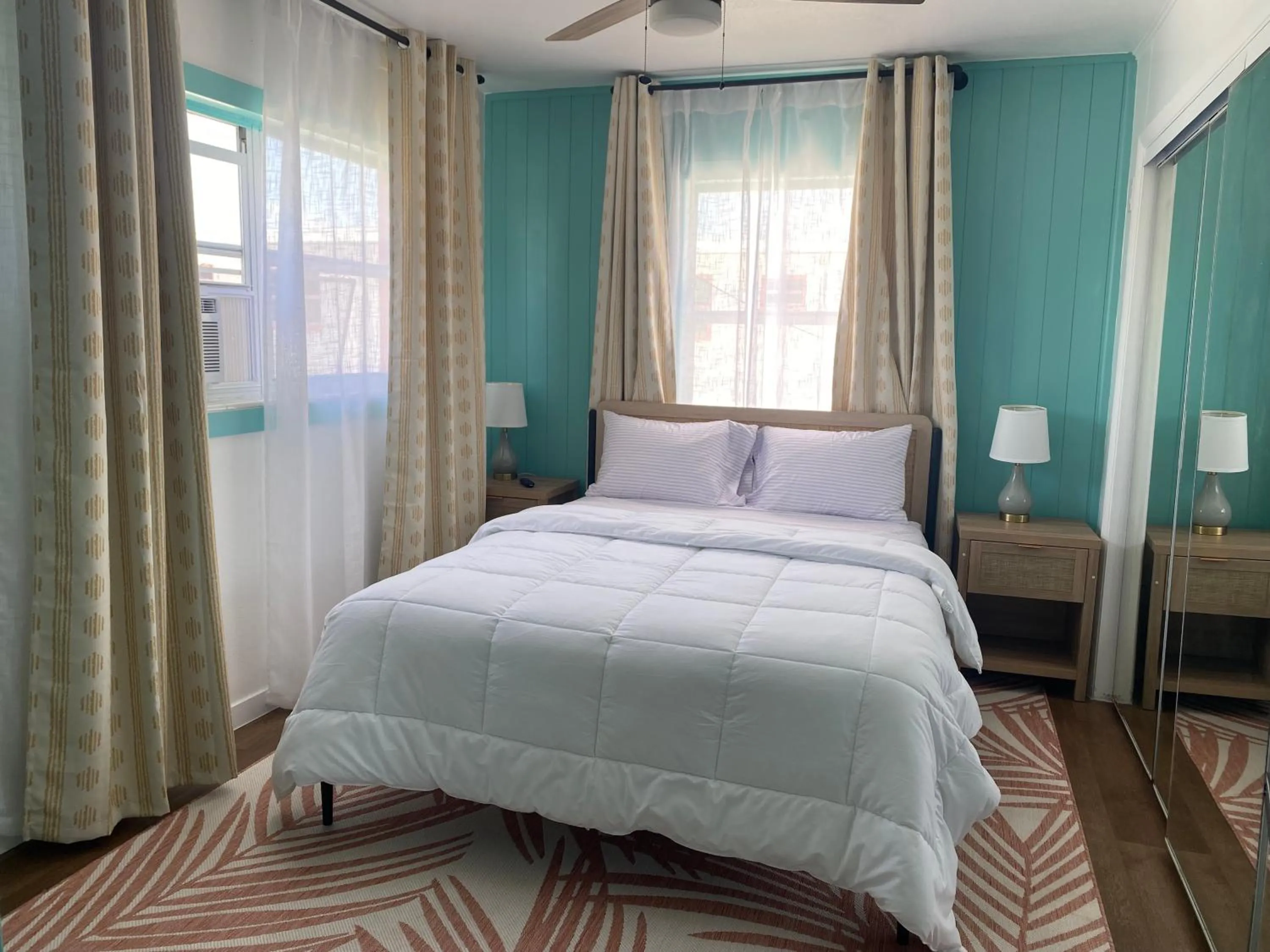 Bed in Oasis Palms Resort