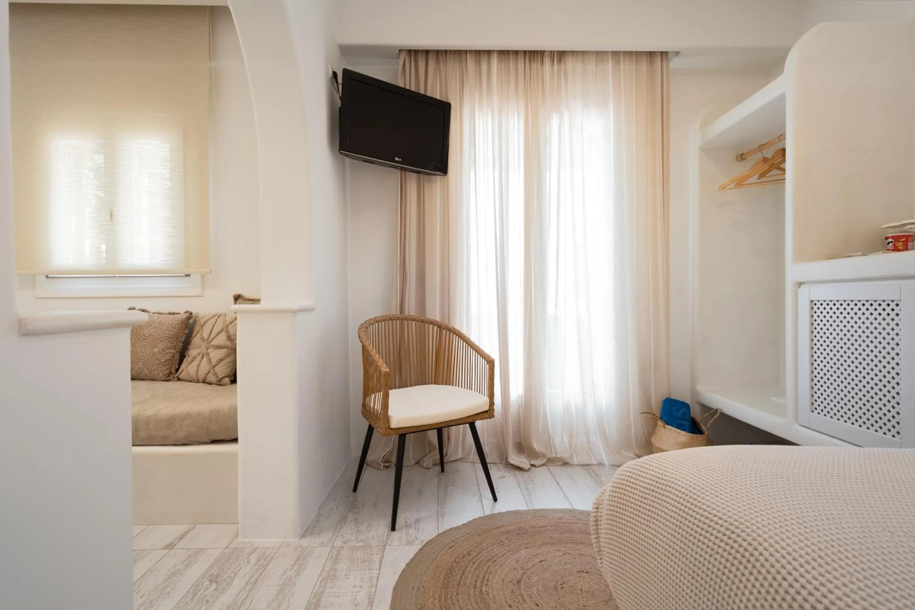 Seating area, Bed in Finikas Hotel