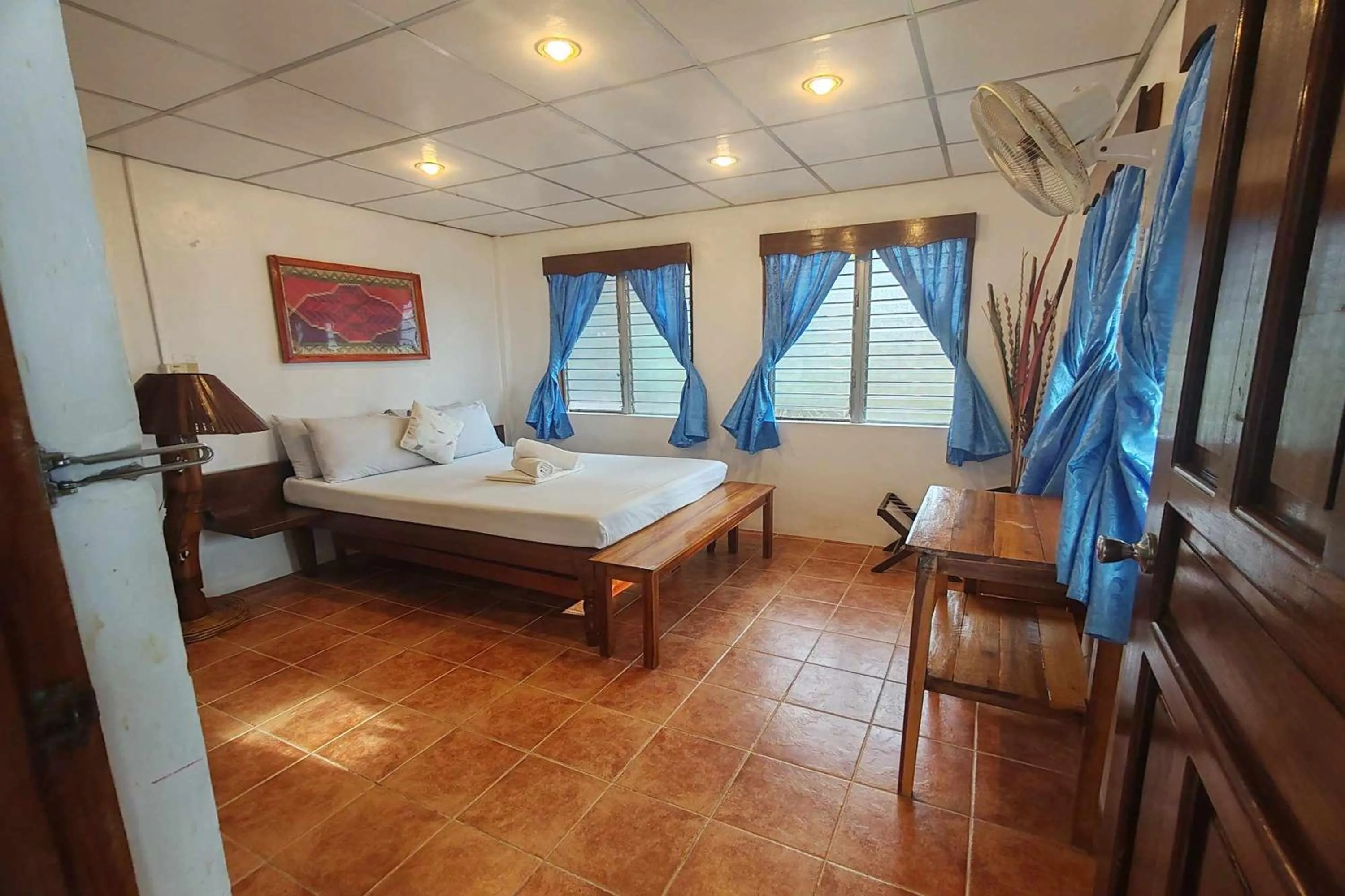 Bed in Summer Homes Beach Front Resort and Cottages Port Barton