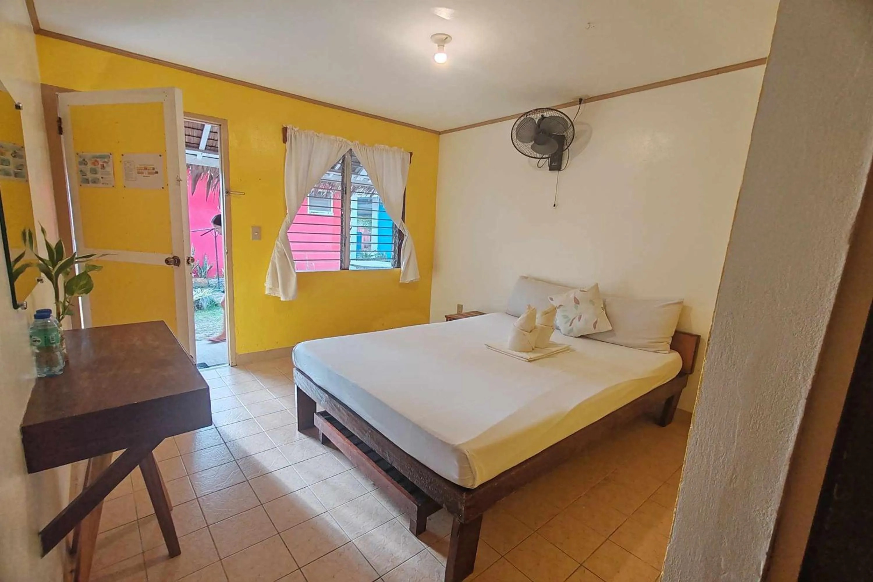 Bed in Summer Homes Beach Front Resort and Cottages Port Barton