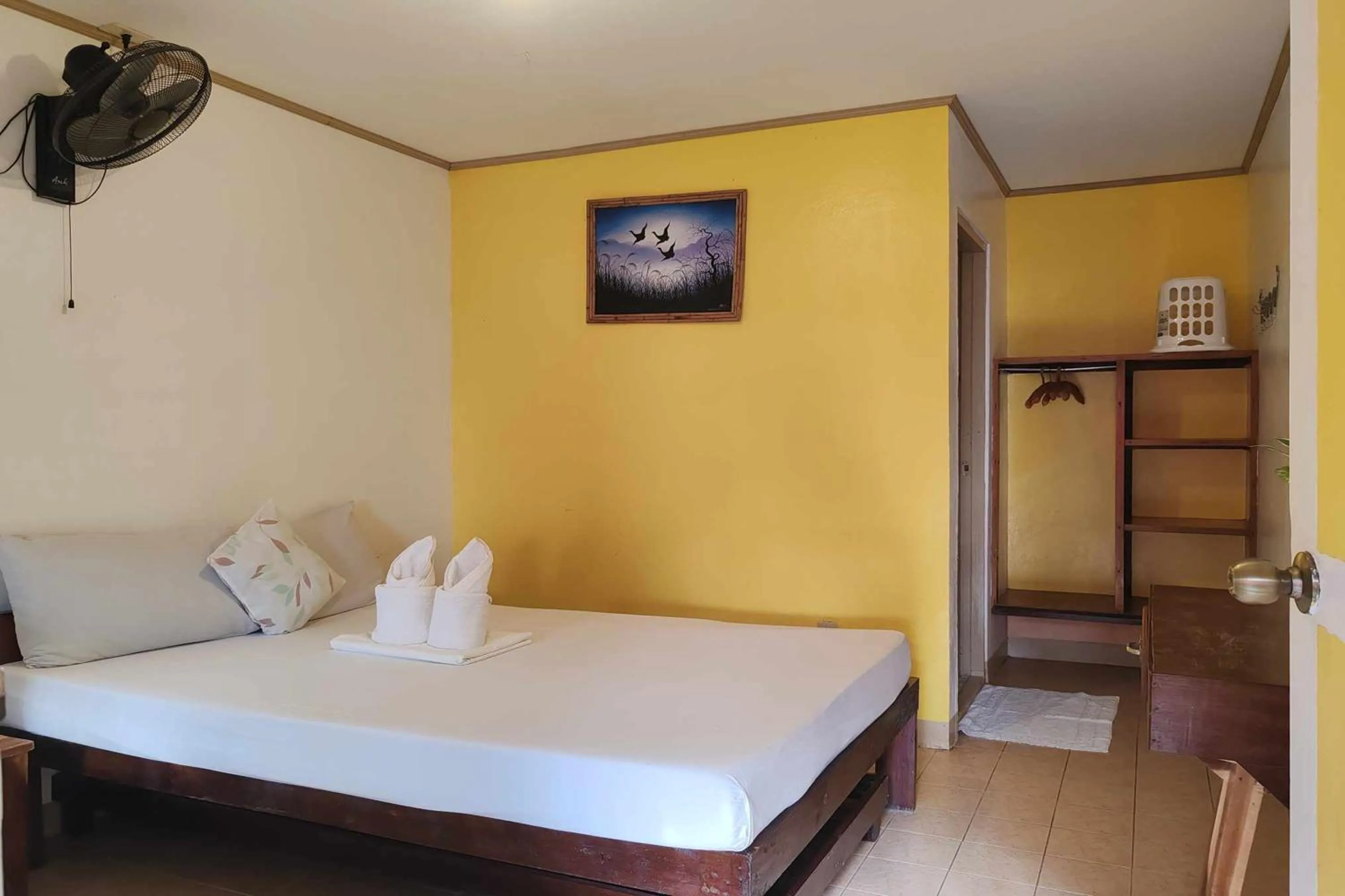 Bed in Summer Homes Beach Front Resort and Cottages Port Barton