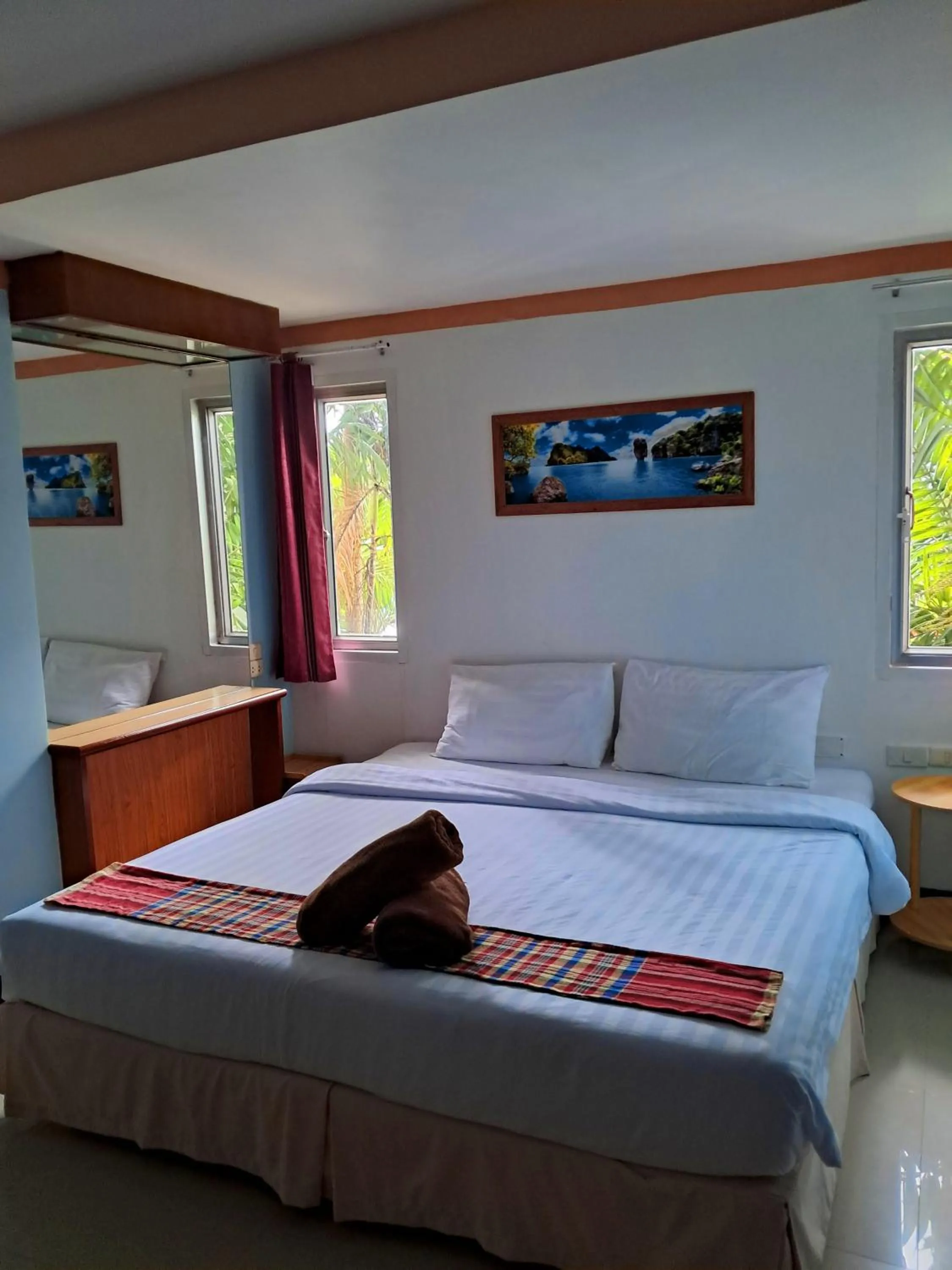 Bed in Baan Thara Guesthouse