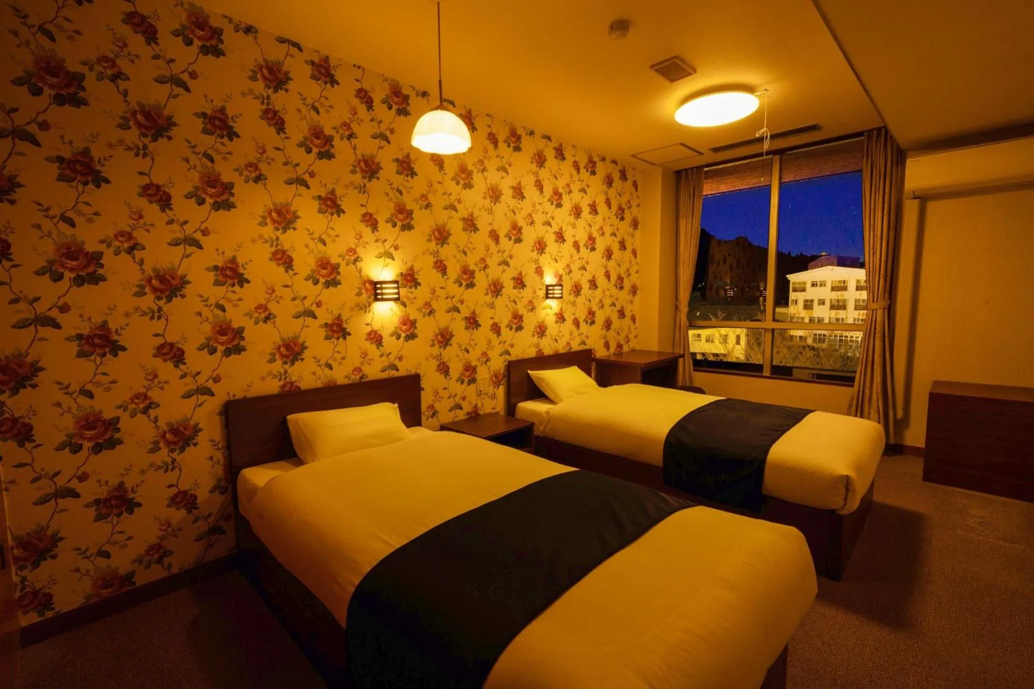 Photo of the whole room, Bed in Ooedo Onsen Monogatari Unzen Toyokan