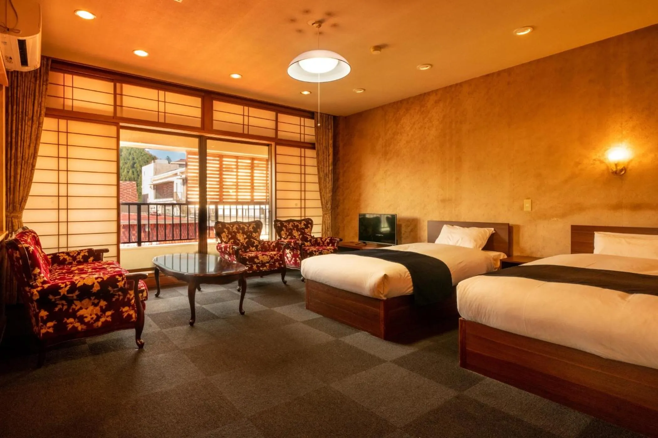 Photo of the whole room, Bed in Ooedo Onsen Monogatari Unzen Toyokan