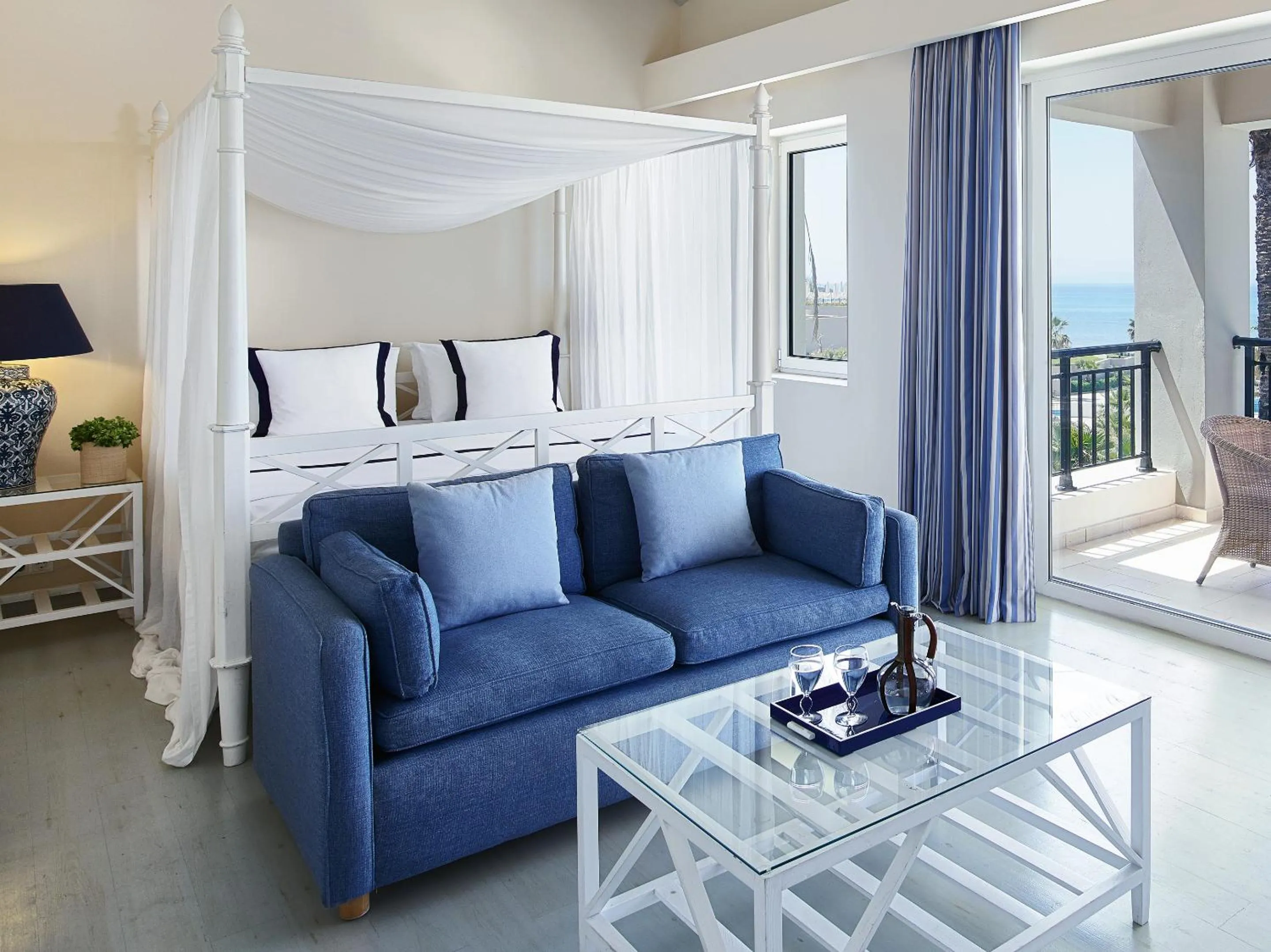 Living room, Bed in Grecotel La Riviera at Riviera Olympia & Aqua Park