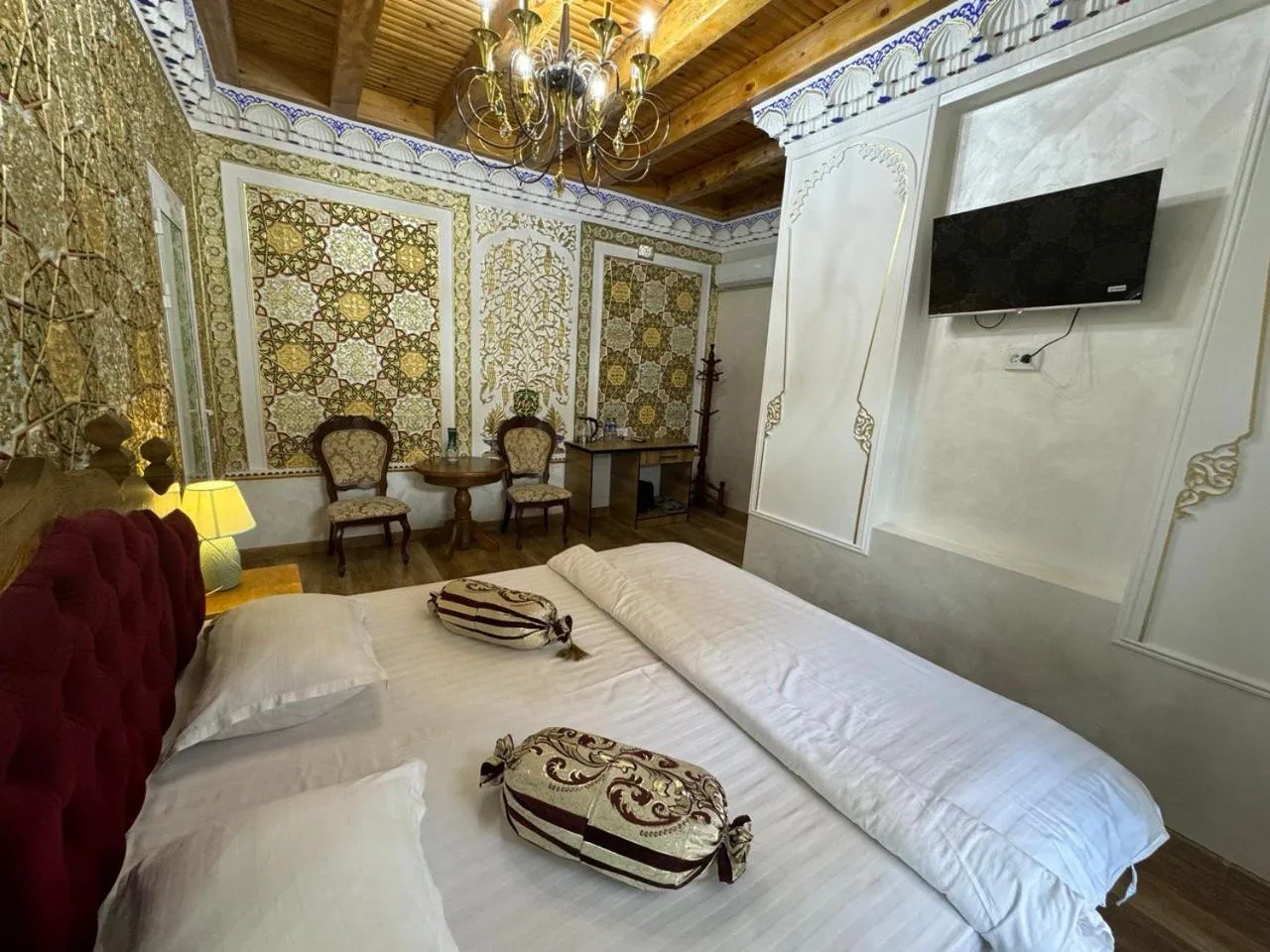 Living room, Bed in Central Asia Hotel