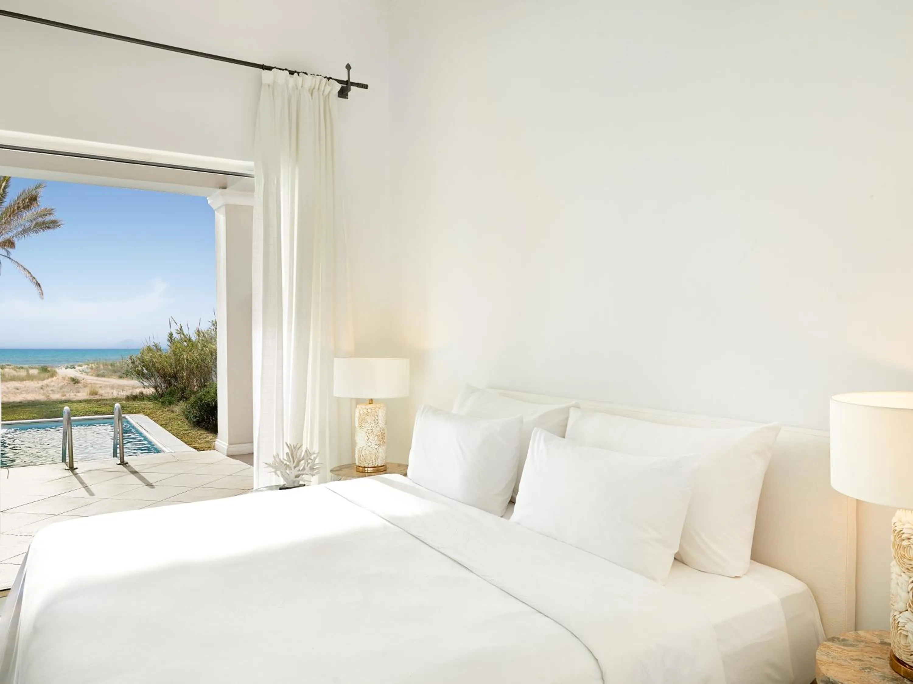 Bed in Mandola Rosa at Riviera Olympia, A Grecotel Resort to Live