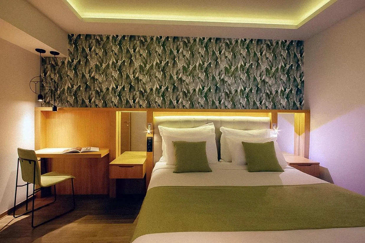 Bed in Zeus Dolce by Wyndham Athens