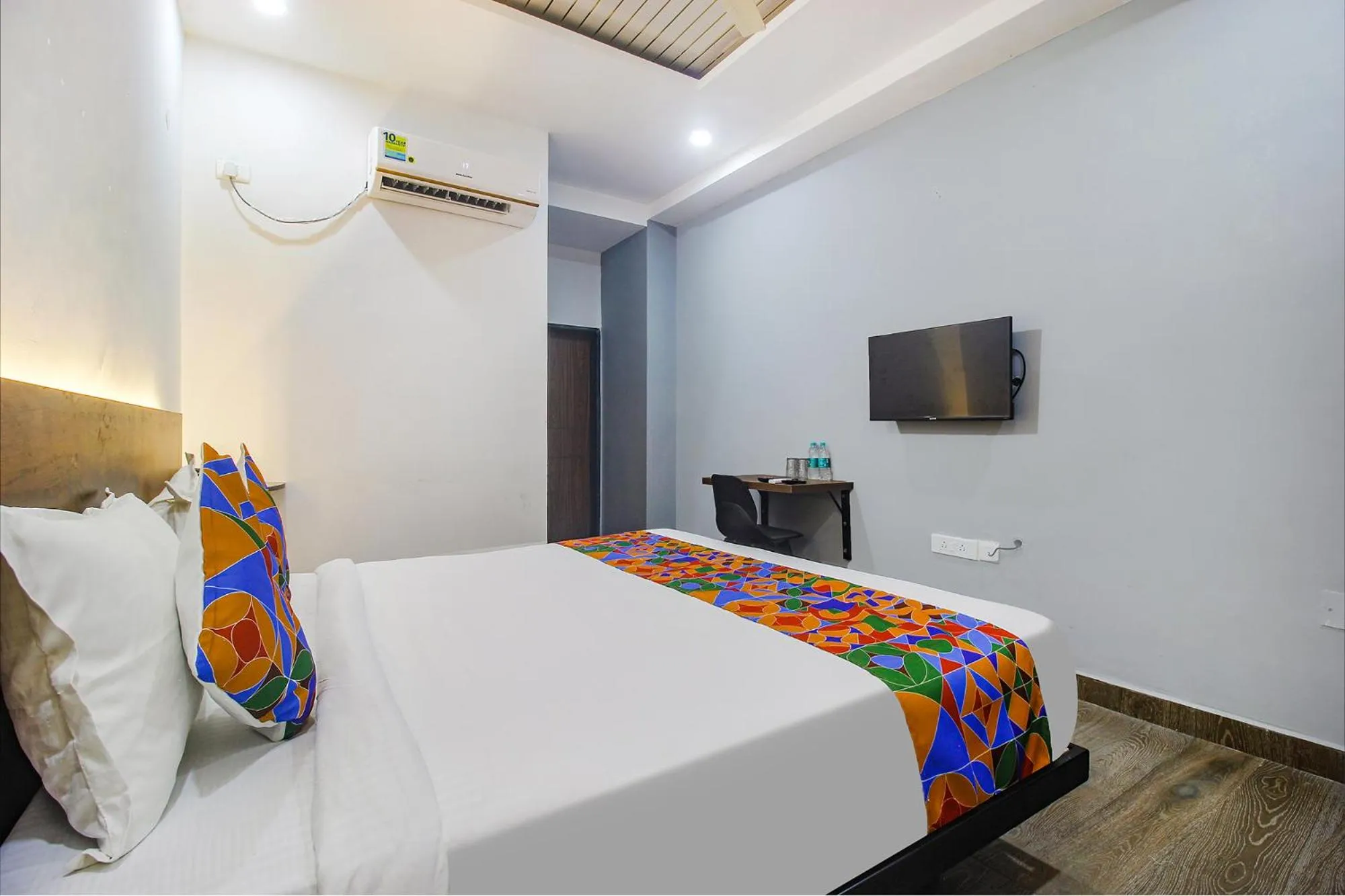 Communal lounge/ TV room, Bed in FabHotel W Grand Suites