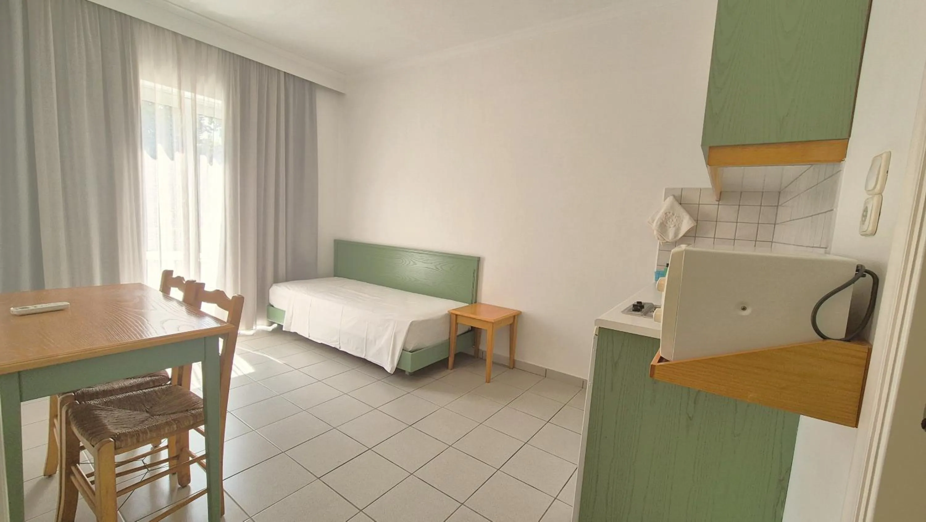 Photo of the whole room, Bed in Andromeda Hotel Apartments