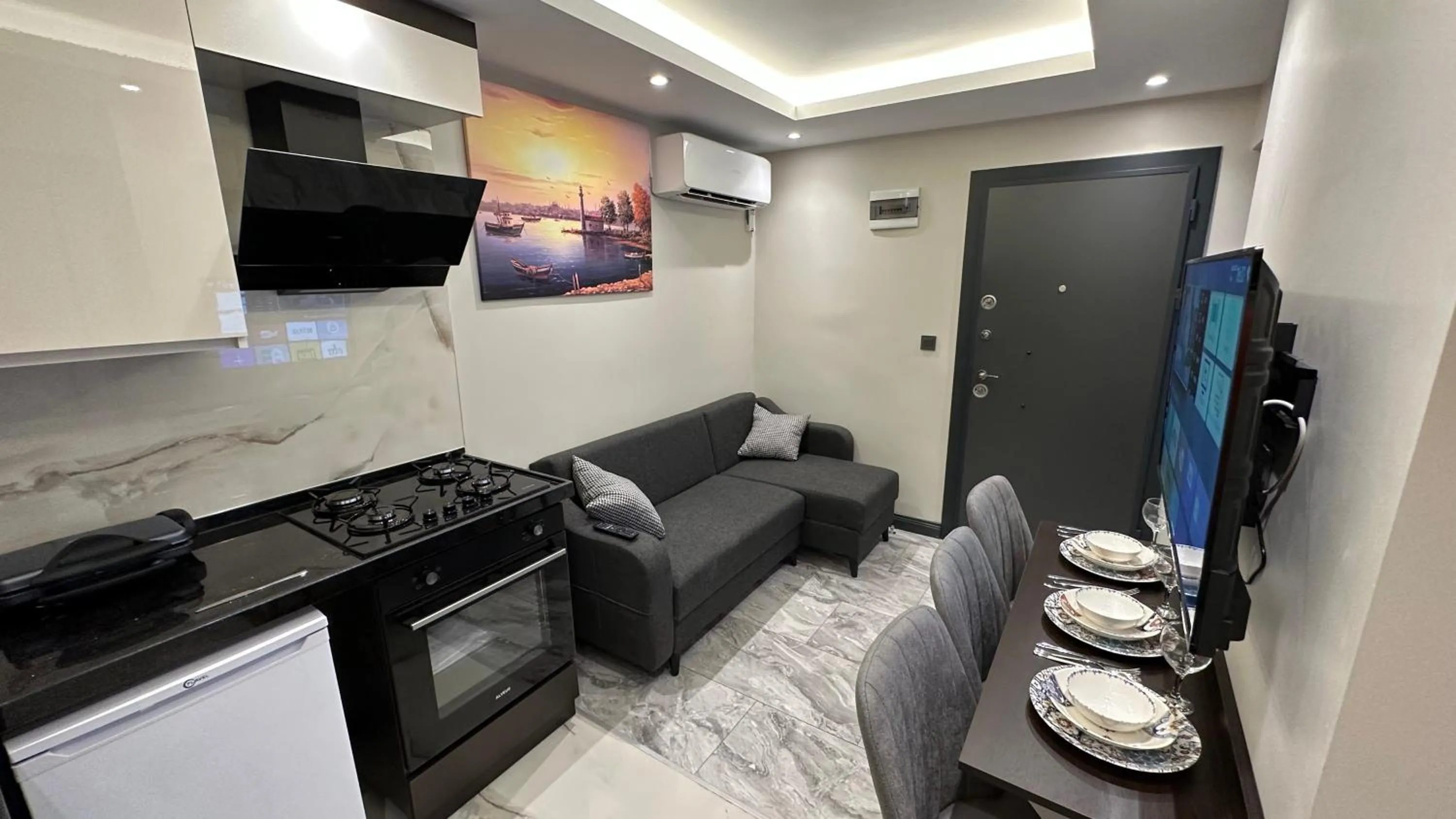 TV and multimedia in Mar Boutique Apartment