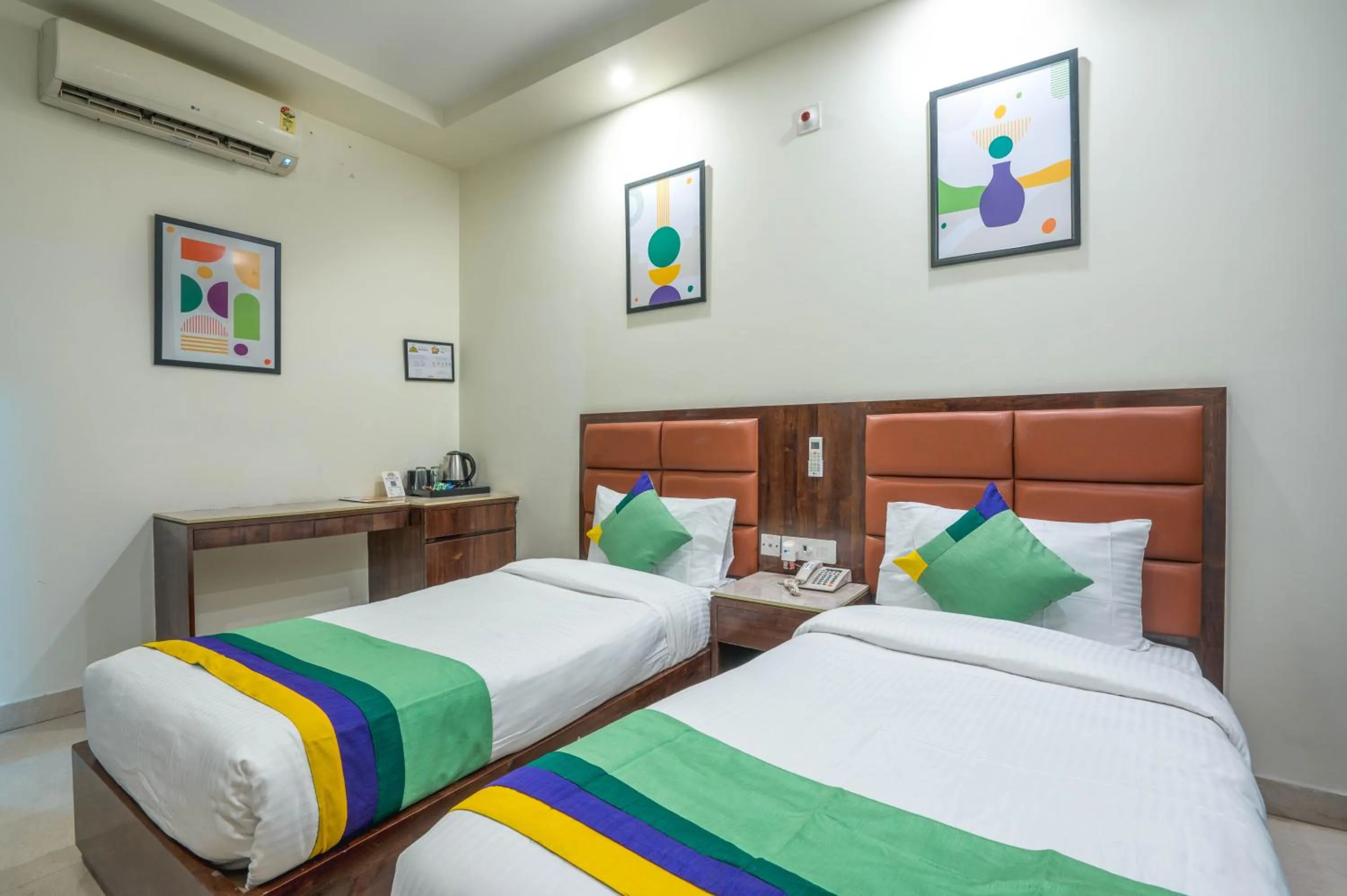 Bedroom, Bed in Treebo Sunny Feast