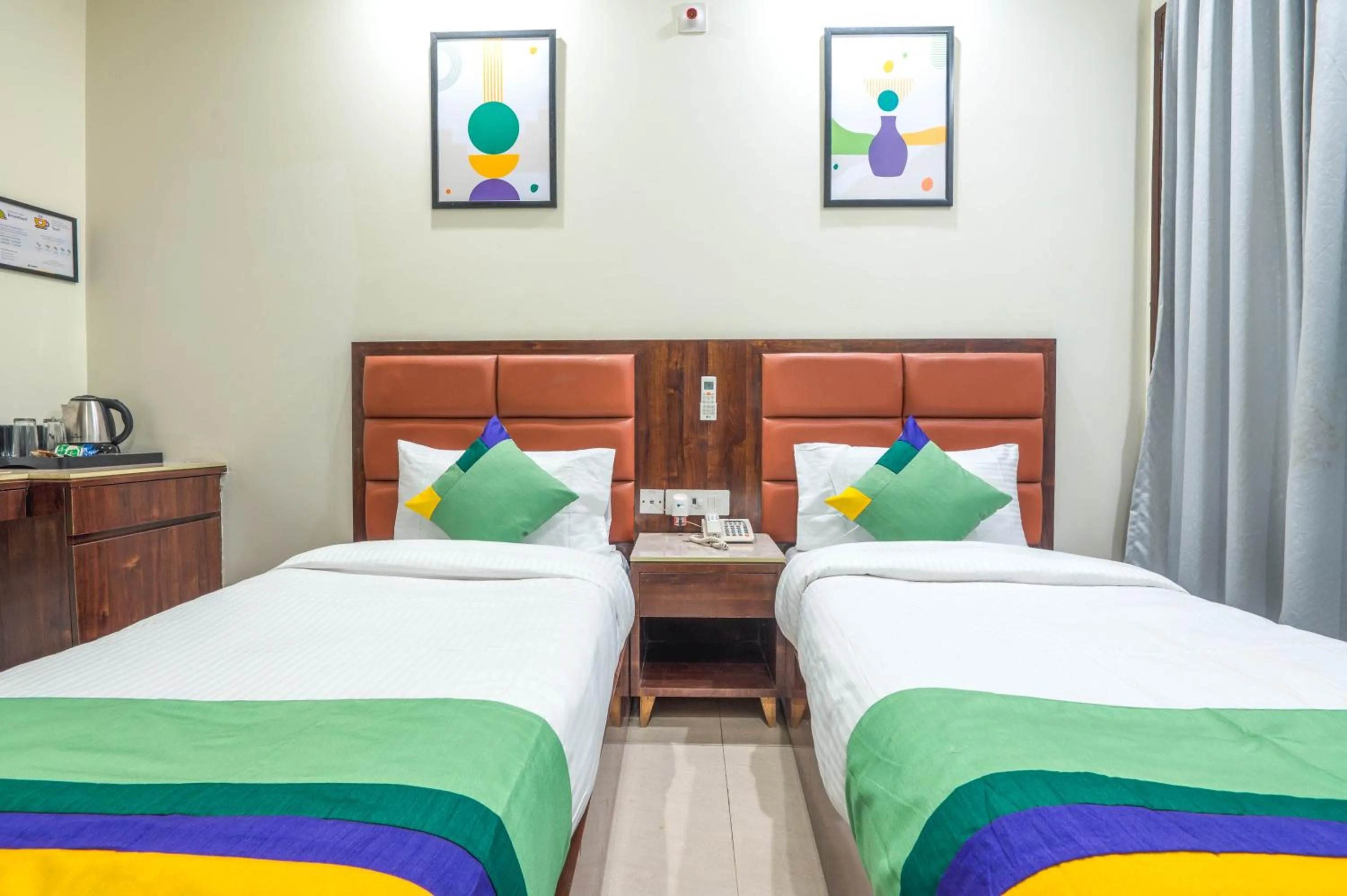 Bedroom, Bed in Treebo Sunny Feast