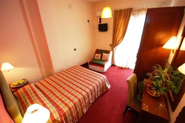 Bed in Hotel Elvetia