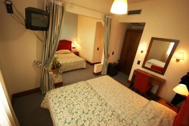 Bed in Hotel Elvetia