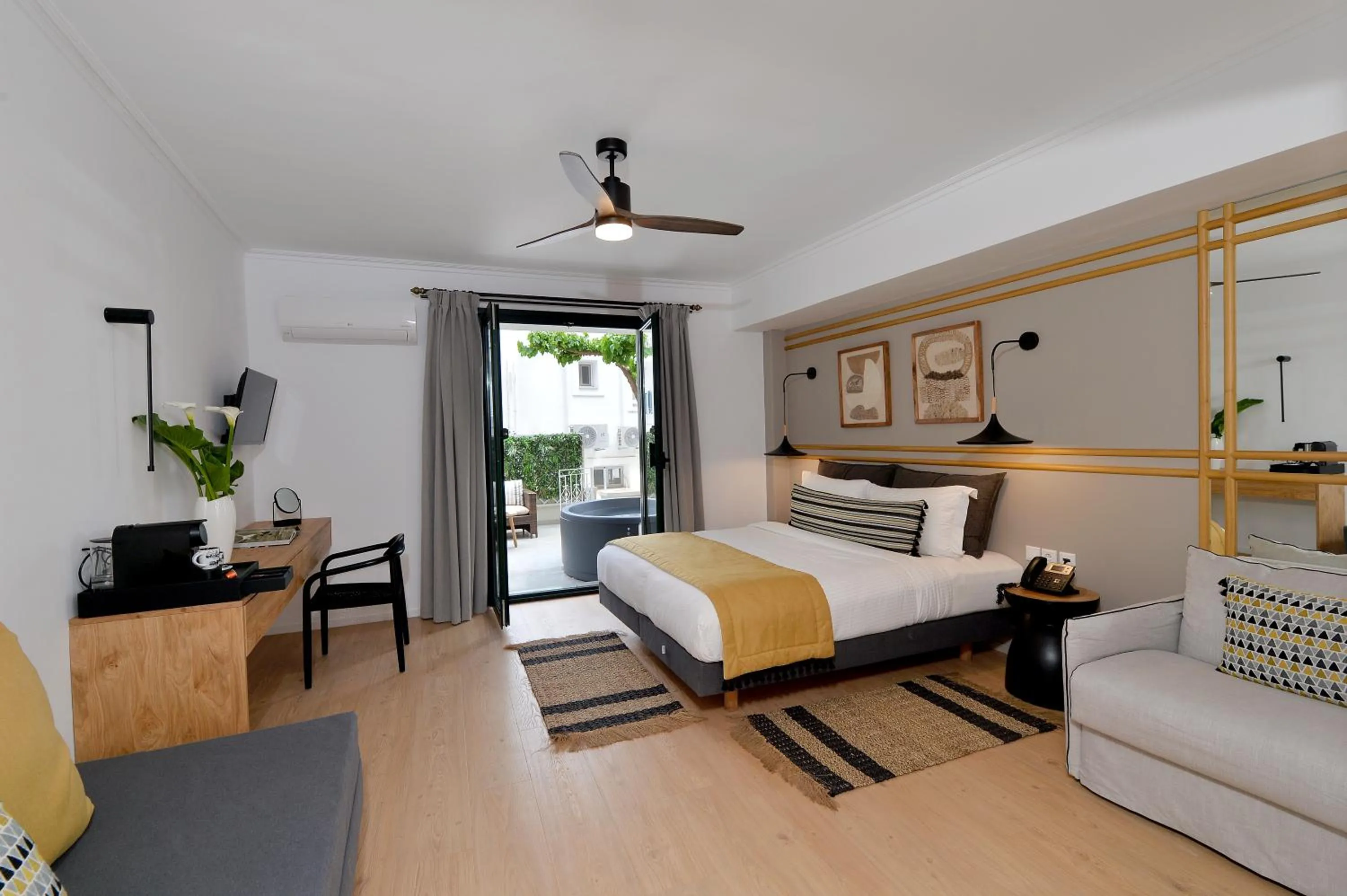 Photo of the whole room, Bed in Aktaion Beach Boutique Hotel & Spa