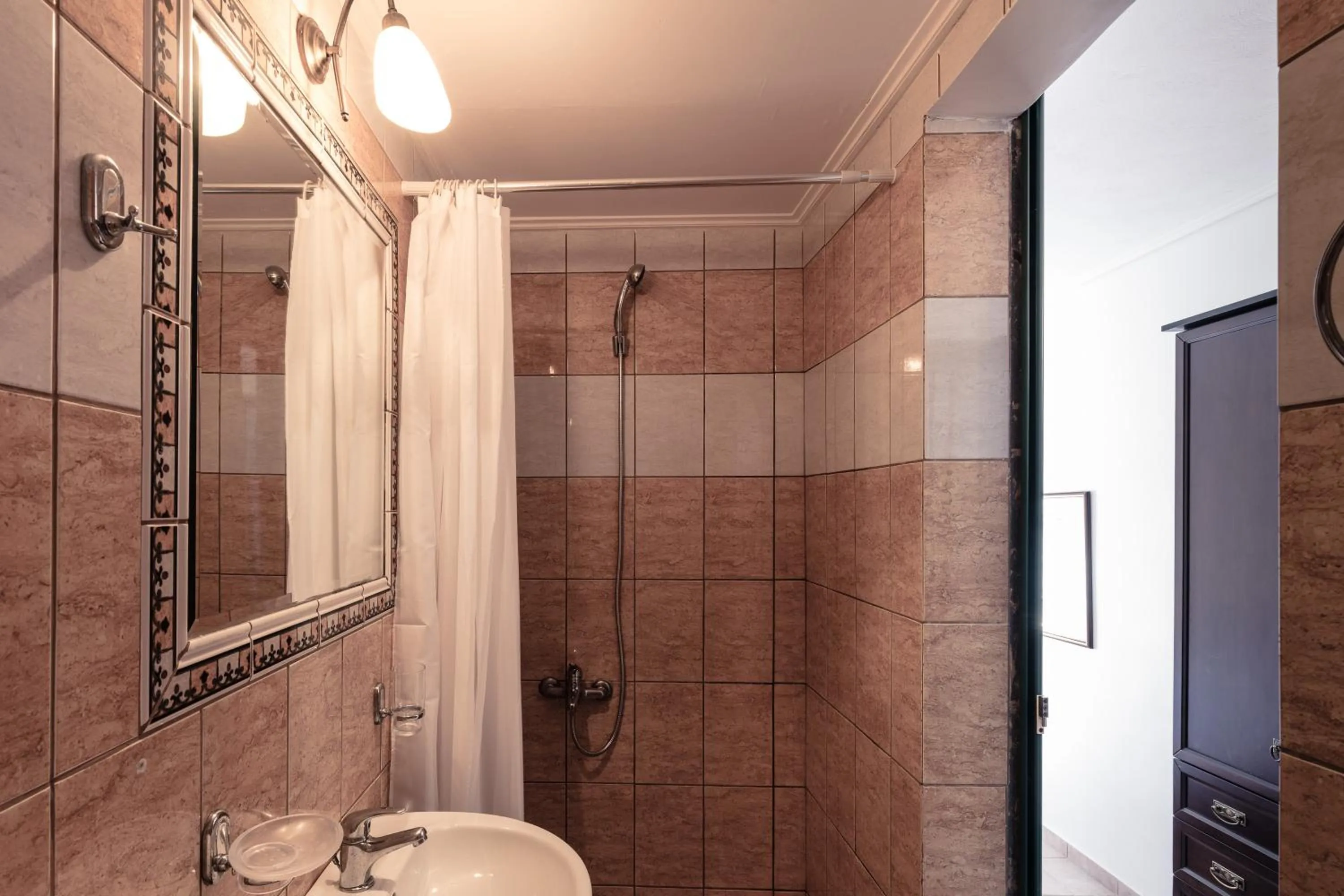 Bathroom in Dionysos Hotel