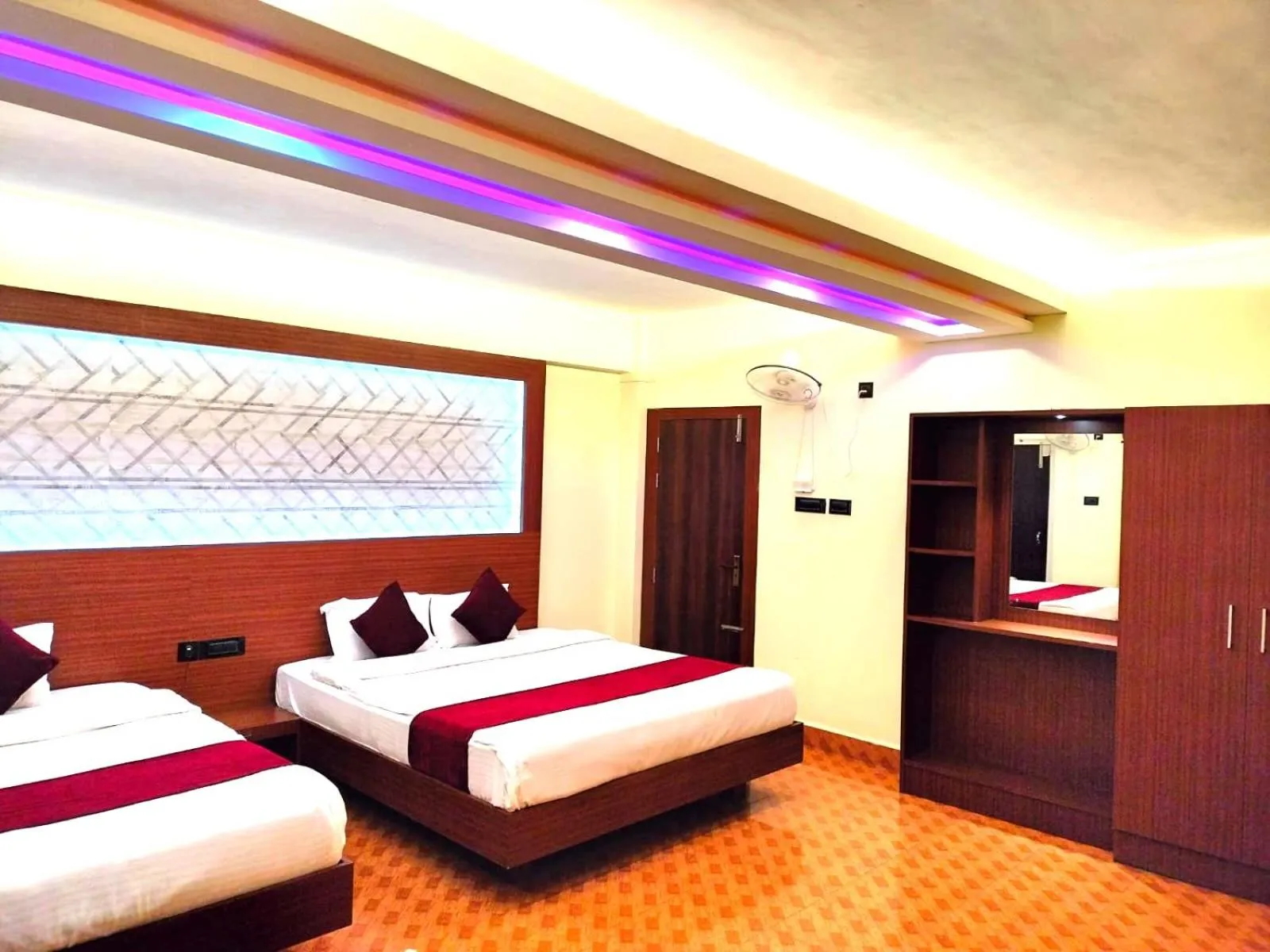 Bed in LILY GUEST HOUSE