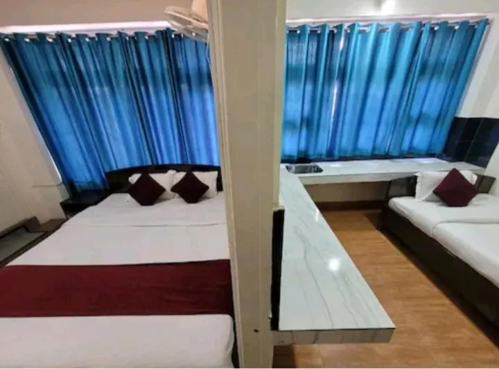 Bed in LILY GUEST HOUSE