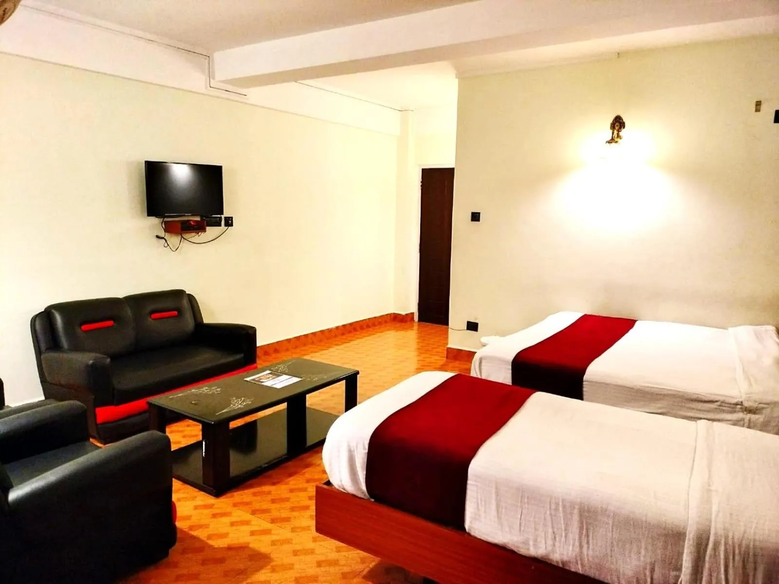 Bed in LILY GUEST HOUSE