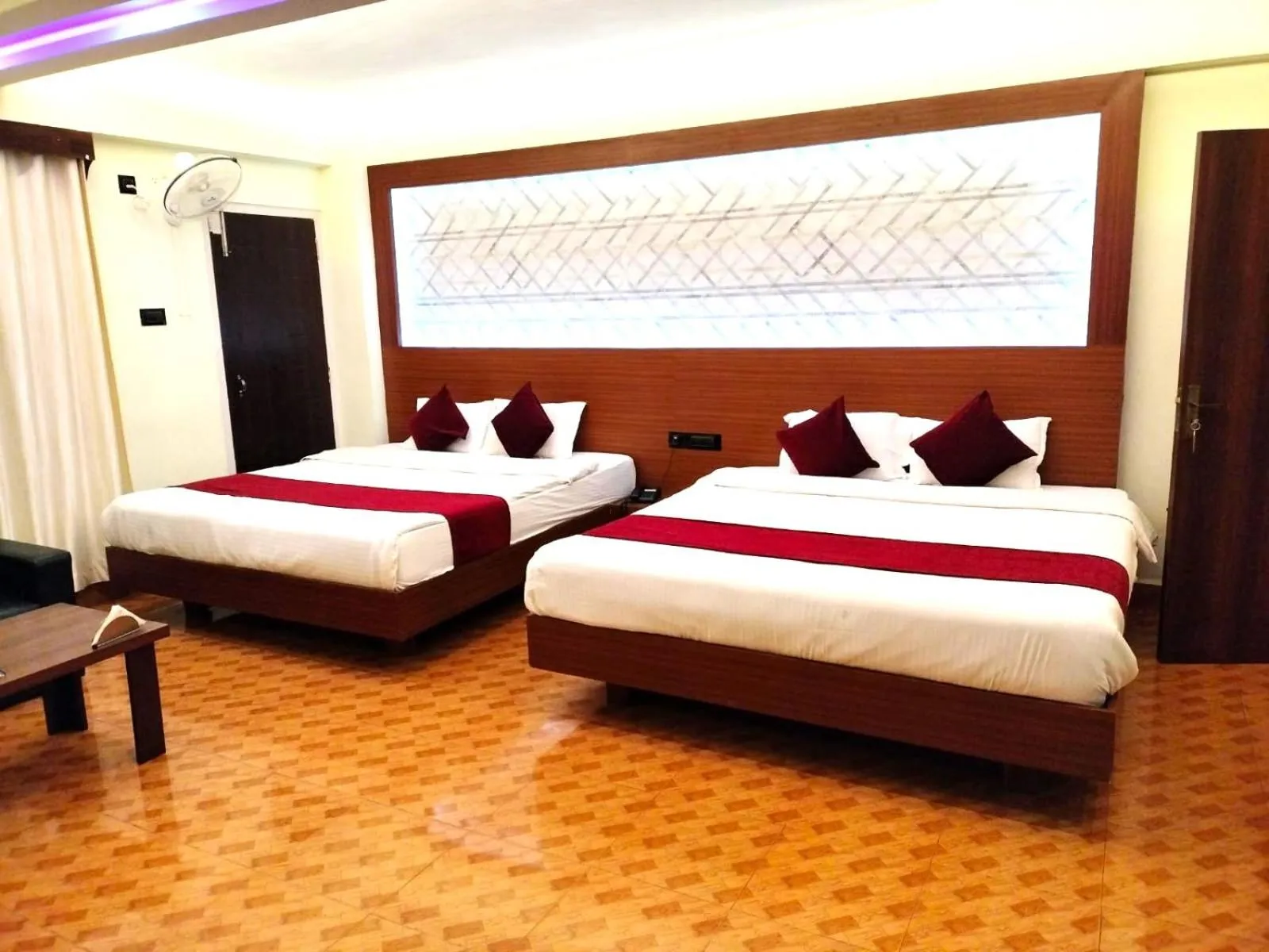 Bed in LILY GUEST HOUSE